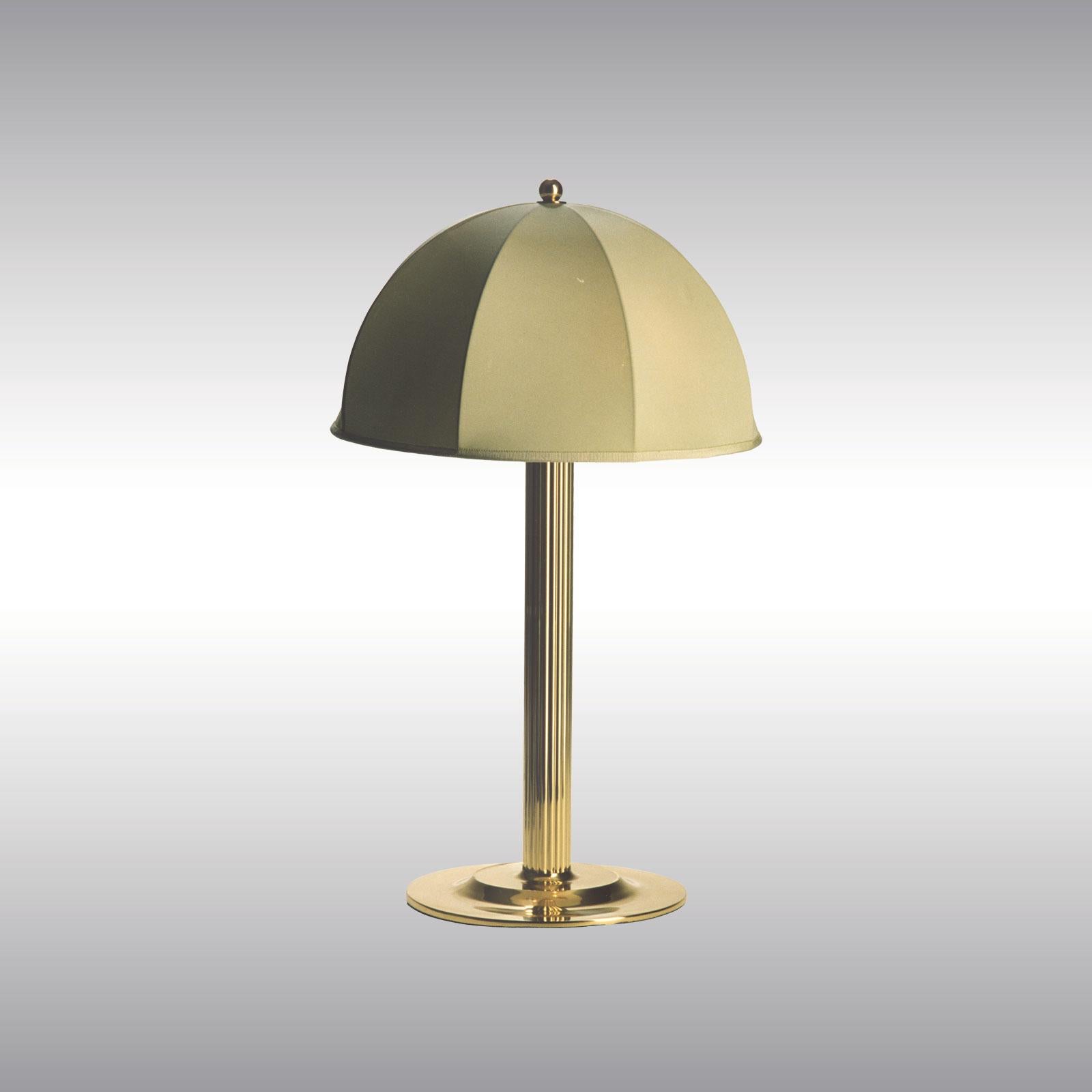 Ähnlich wie die Steiner-Lampe von Adolf Loos, aber mit einem Seidenschirm. Veröffentlicht in Deutsche Kunst und Dekoration im Jahr 1915 für das Schlafzimmer der Familie Primavesi.

Die meisten Komponenten entsprechen den UL-Vorschriften, gegen