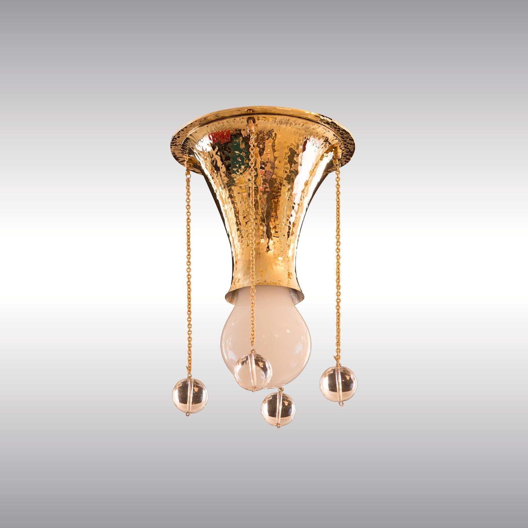 Hanging- lamp from the showrooms of the Wiener Werkstaette used by Hoffmann in several variations. Hammered originally. Works-number M115, pattern-book of the Wiener Werkstaette: WWMB 3 p. 256-257

All components according to the UL regulations,