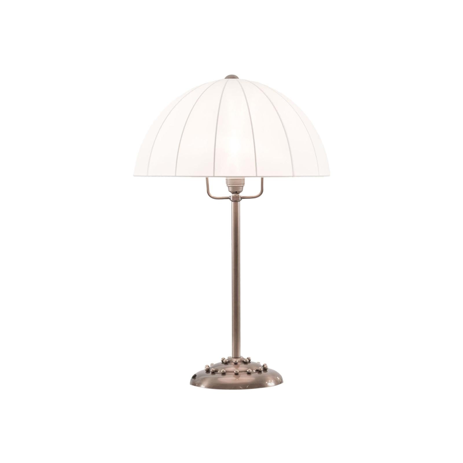Desk lamp, originally manufactured at the historical Wiener Werkstätte and archived at the WW-pattern-books with the # S 142 - all in all, just eight lamps were manufactured at the WW. 

Most components according to the UL regulations, with an