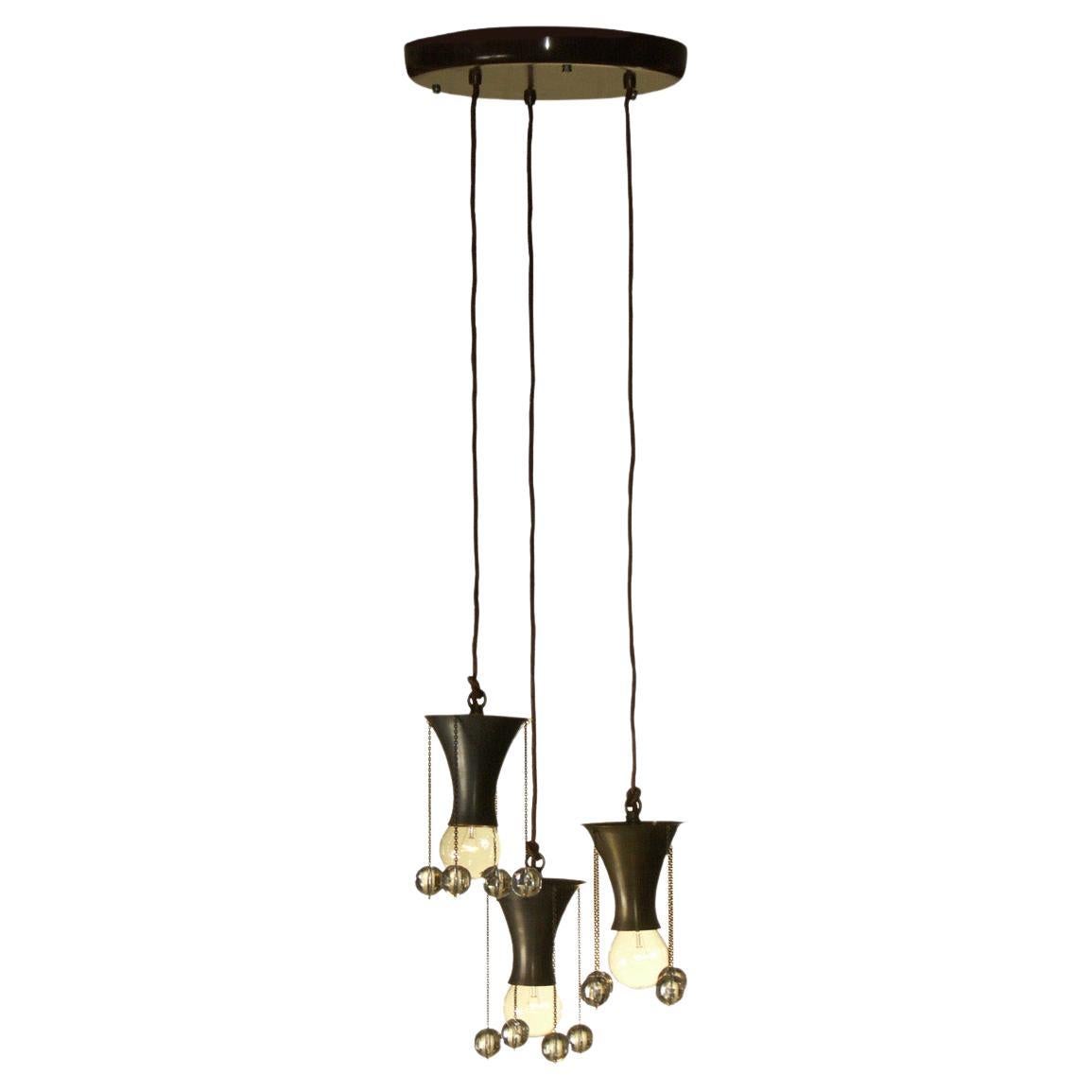 Pendant, used in several Versions in Showrooms of the Wiener Werkstätte. Also available in a single 
Originally manufactured at the Wiener Werkstätte Atelier, now custom-made production at the Woka Lamps Workshop in Vienna.
Sockets: 3 x Edison screw