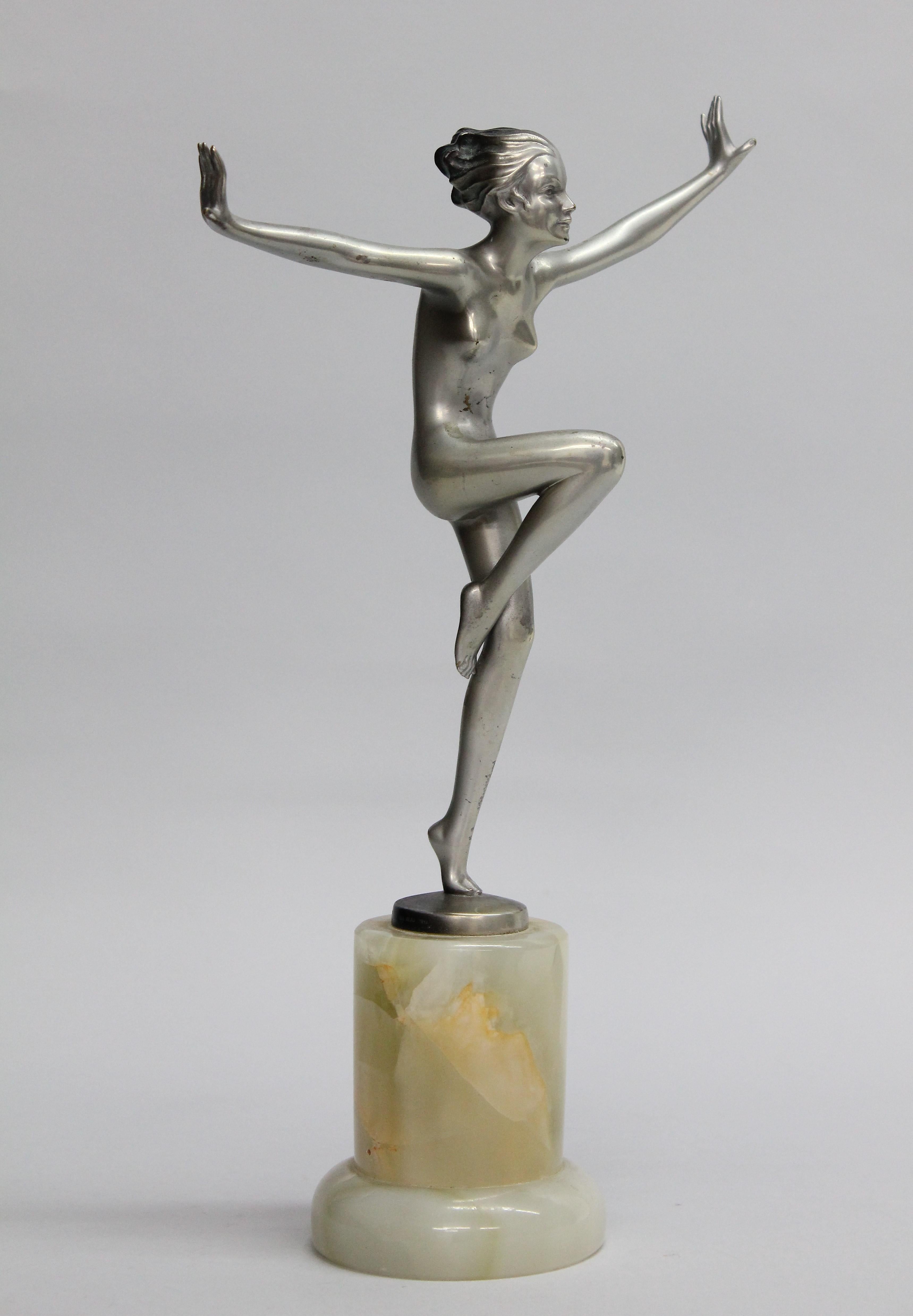 Josef Lorenzl Art Deco bronze sculpture.

Size: Height 33cm.
The cold painted bronze sculpture is mounted on a Brazilian green onyx plinth.
All in an original condition. It has not been later painted or patinated.
Signed 