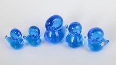 Josef Marcolin for FM Ronneby. Set of five duck figurines in blue art glass.