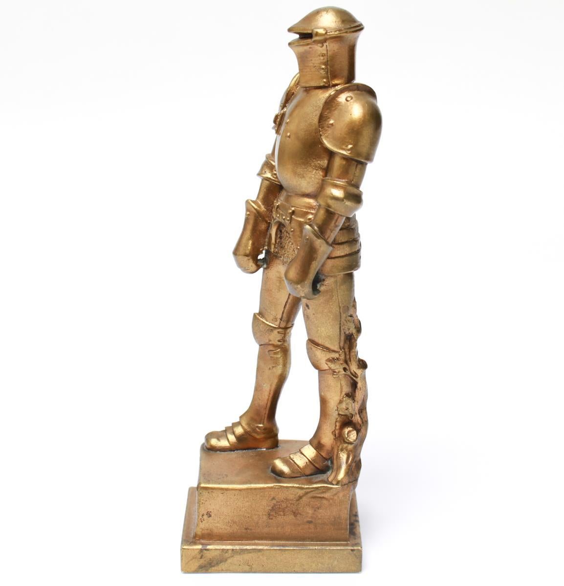 World War I Militaria gilt-bronzed cast iron figure of a knight in armor by Josef Muellner (Austrian 1879-1968). The knight stands atop a plinth inscribed 