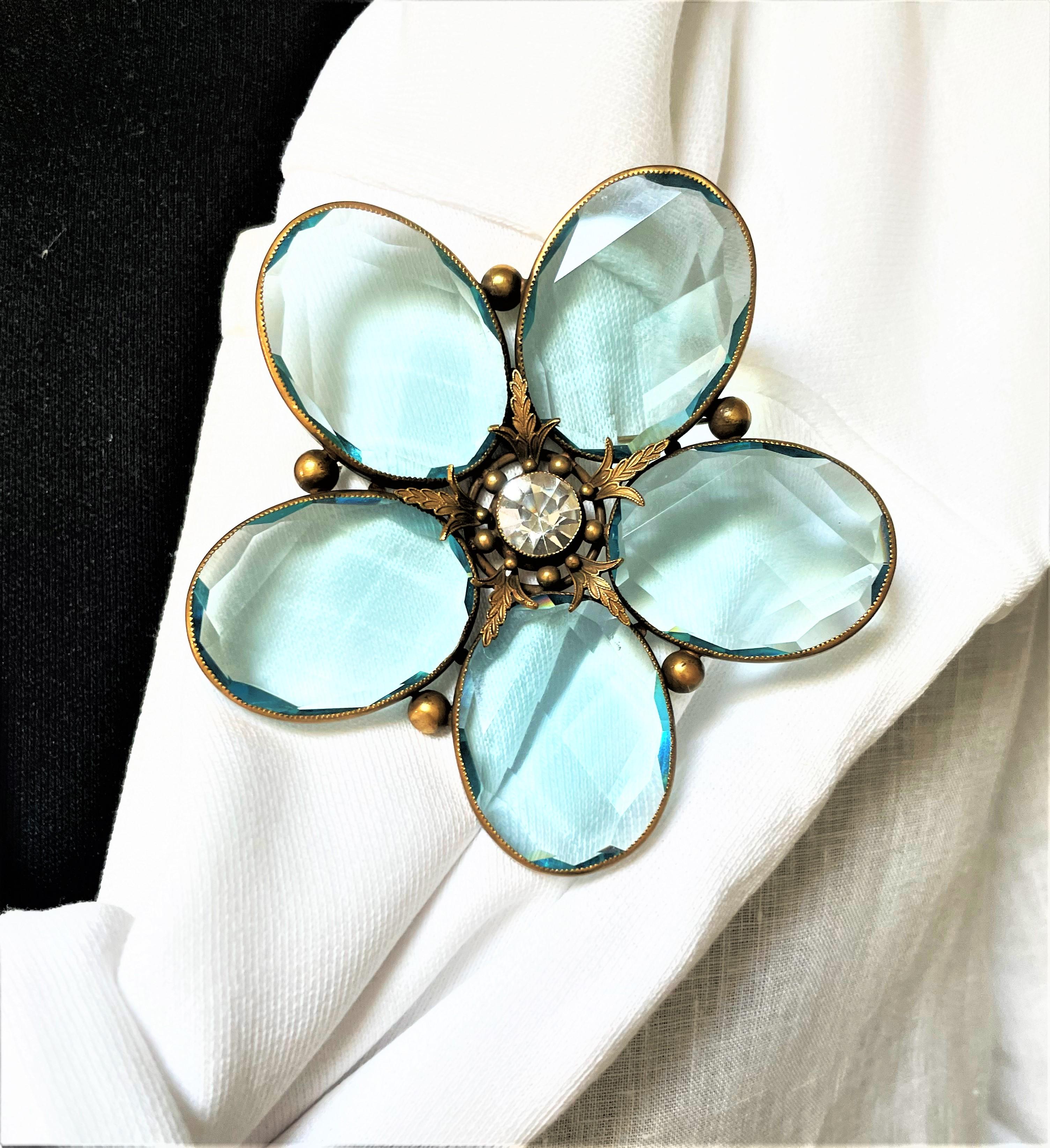 Modern Joseff of Hollywood flower brooch, aqua crystal petals, rhinest brass, 1950s USA For Sale