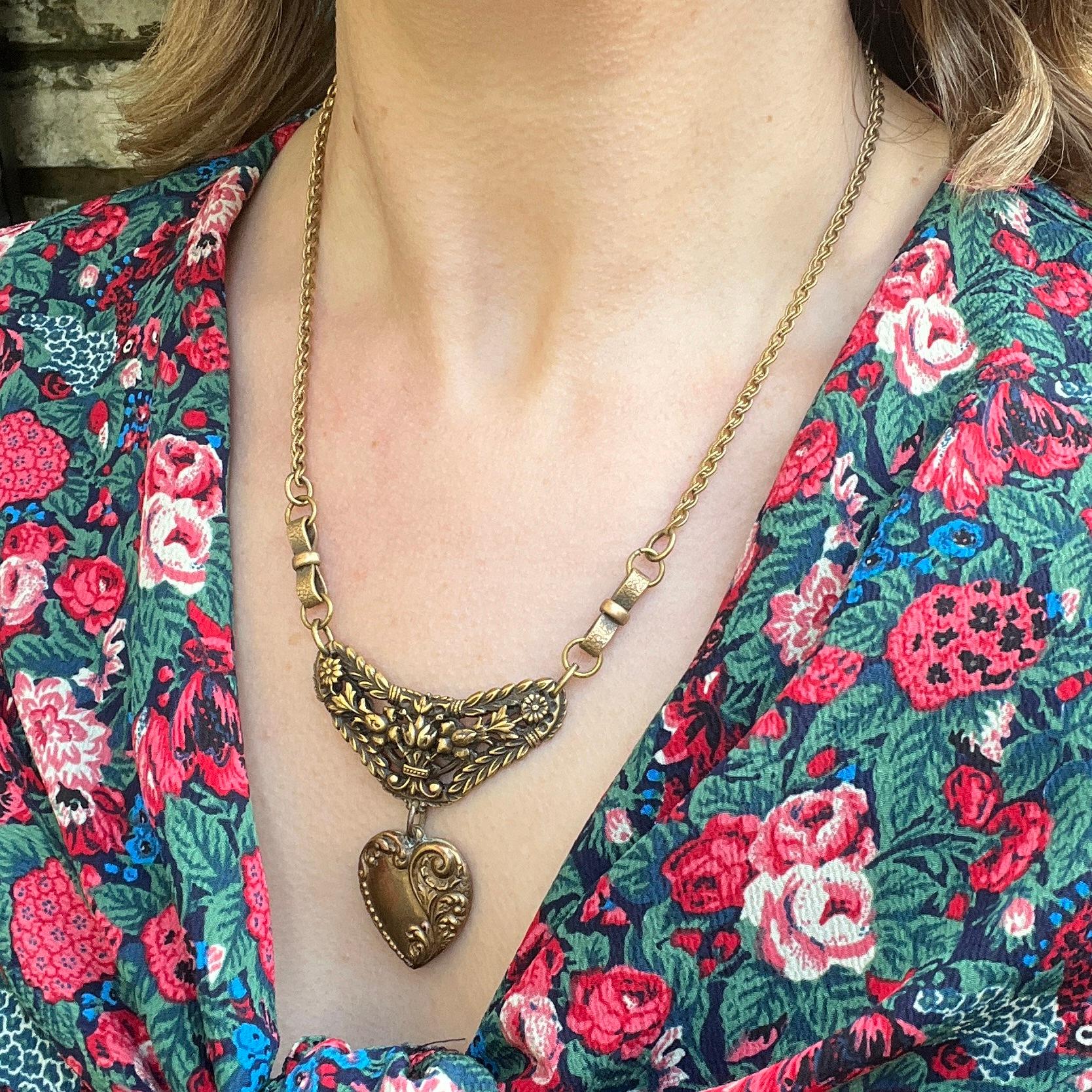 This necklace was most likely created in the 1960s. It is by the renowned costume jeweller, Joseff of Hollywood.

Condition Report:
Very Good - Some rubbing to the gilding on the heart pendant. This is only visible upon close inspection and does not