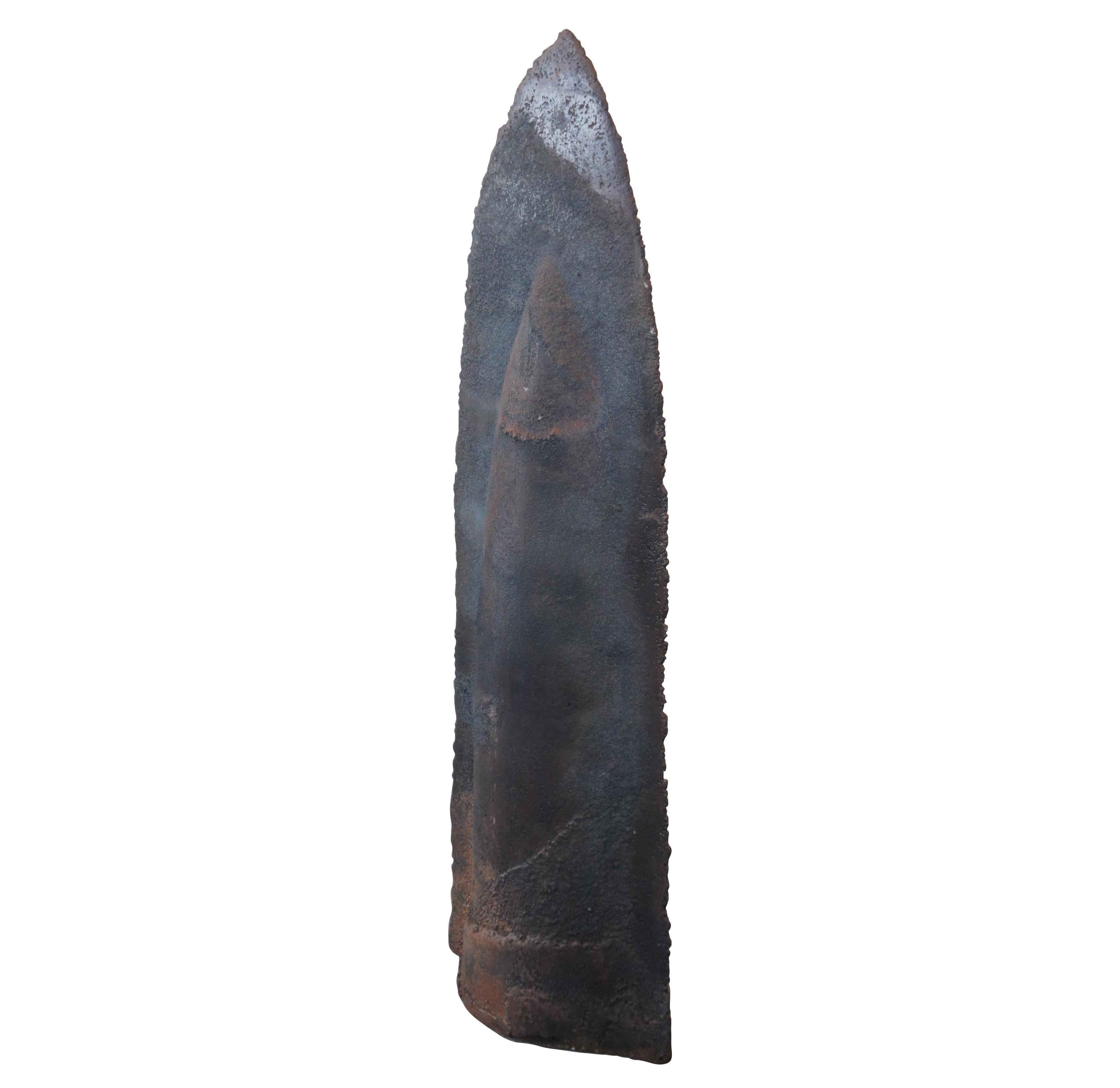 An Impressive Cast Iron floor sculpture by Josep Maria Subirachs, circa 1960s. Reminiscent in form to an arrowhead or primitive blade. Josep incorporated grattage leaving the surface rough and jagged. Signed along the lower edge. From the private