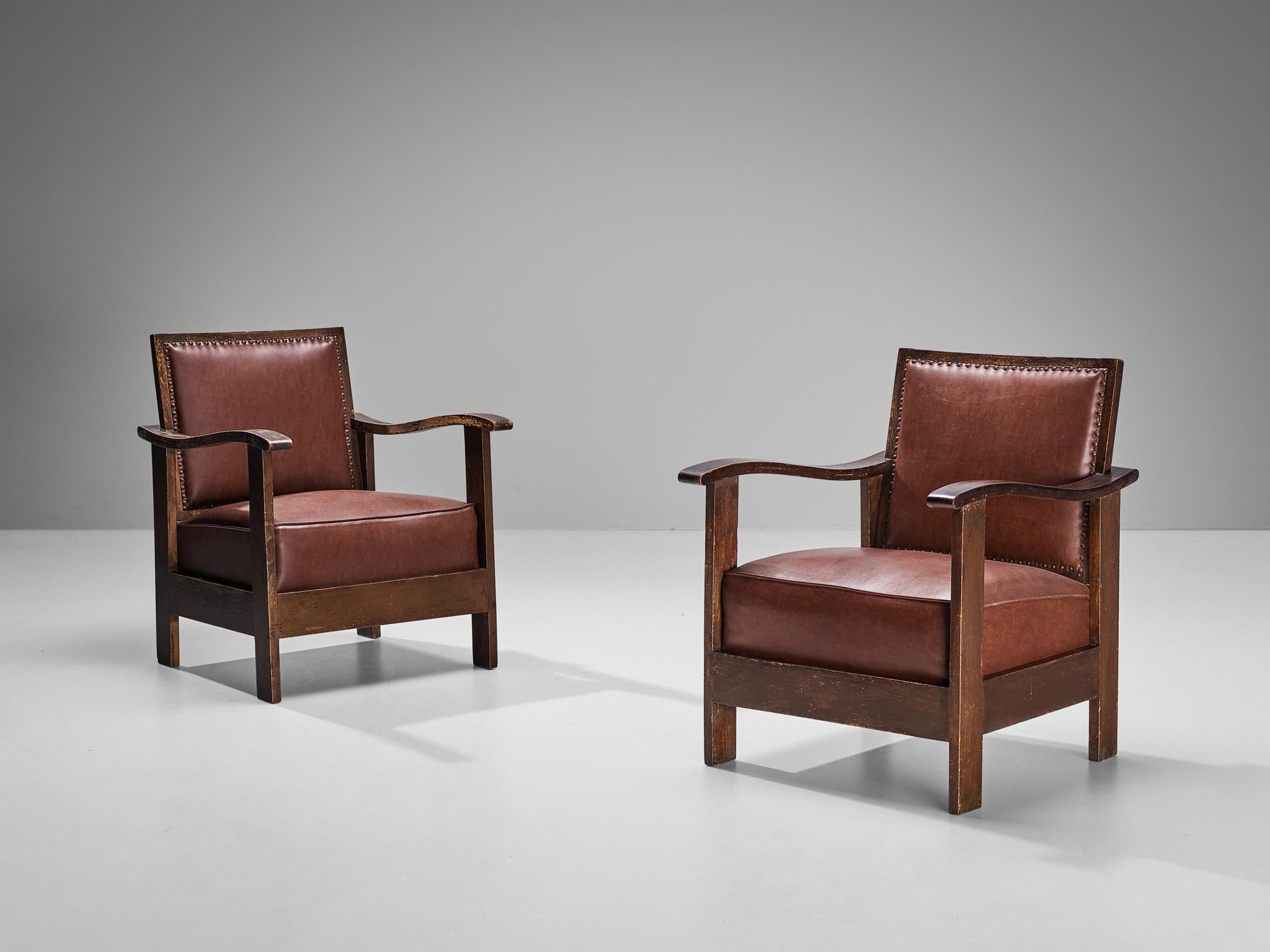 Josep Palau Oller, pair of lounge chairs, stained beech, leather, brass, Barcelona, Spain, circa 1930

Beautifully constructed pair of lounge chairs of Spanish origin designed by Josep Palau Oller (1888-1961). The design embodies an evolved rustic