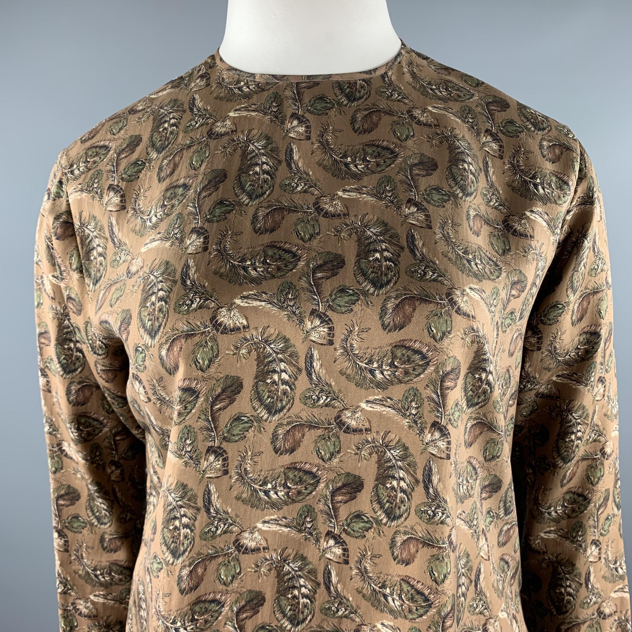 JOSEPH ABBOUD blouse comes in a brown feather print silk featuring a back button detail.

Excellent Pre-Owned Condition.
Marked: 46/12

Measurements:

Shoulder: 18 in. 
Bust: 42 in. 
Sleeve: 21.5 in. 
Length: 26 in. 

SKU: 94307
Category: