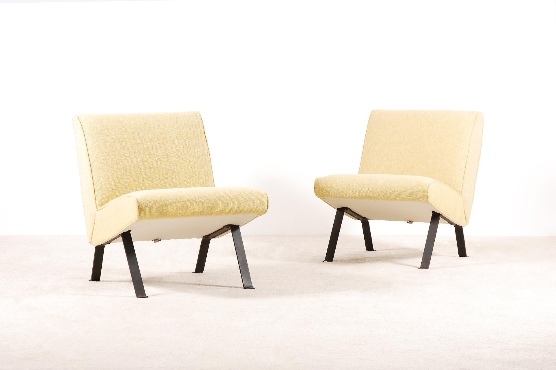This rare pair of lounge chairs was designed by Joseph-André Motte for the exhibition 