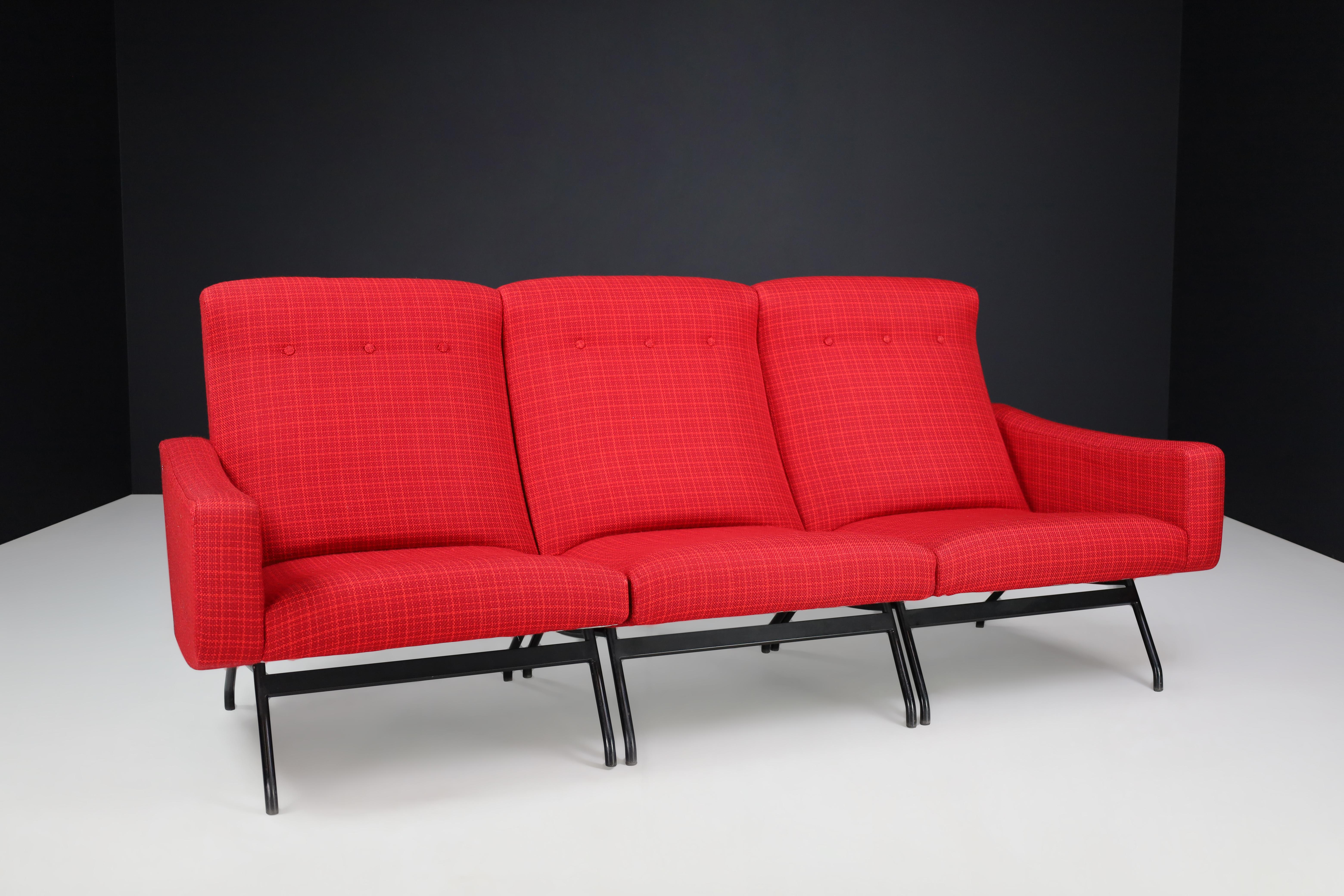 Joseph-André Motte Sectional Sofa Seat in Red Original Upholstery France, 1950s

This is a set of three sectional sofa seats designed by Joseph-Andre´ Motte in France in the 1950s and manufactured by Steiner. The seats are well-made and exhibit