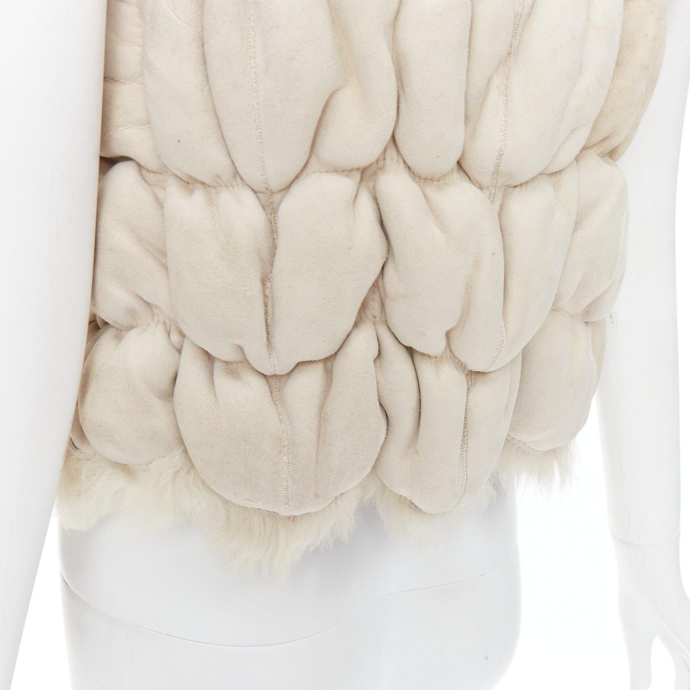JOSEPH beige lambskin leather fur elastic stitching bolero vest FR36 S
Reference: SNKO/A00477
Brand: Joseph
Material: Leather, Fur
Color: Beige
Pattern: Solid
Lining: Beige Fur
Extra Details: Elastic stitching.
Made in: France

CONDITION:
Condition: