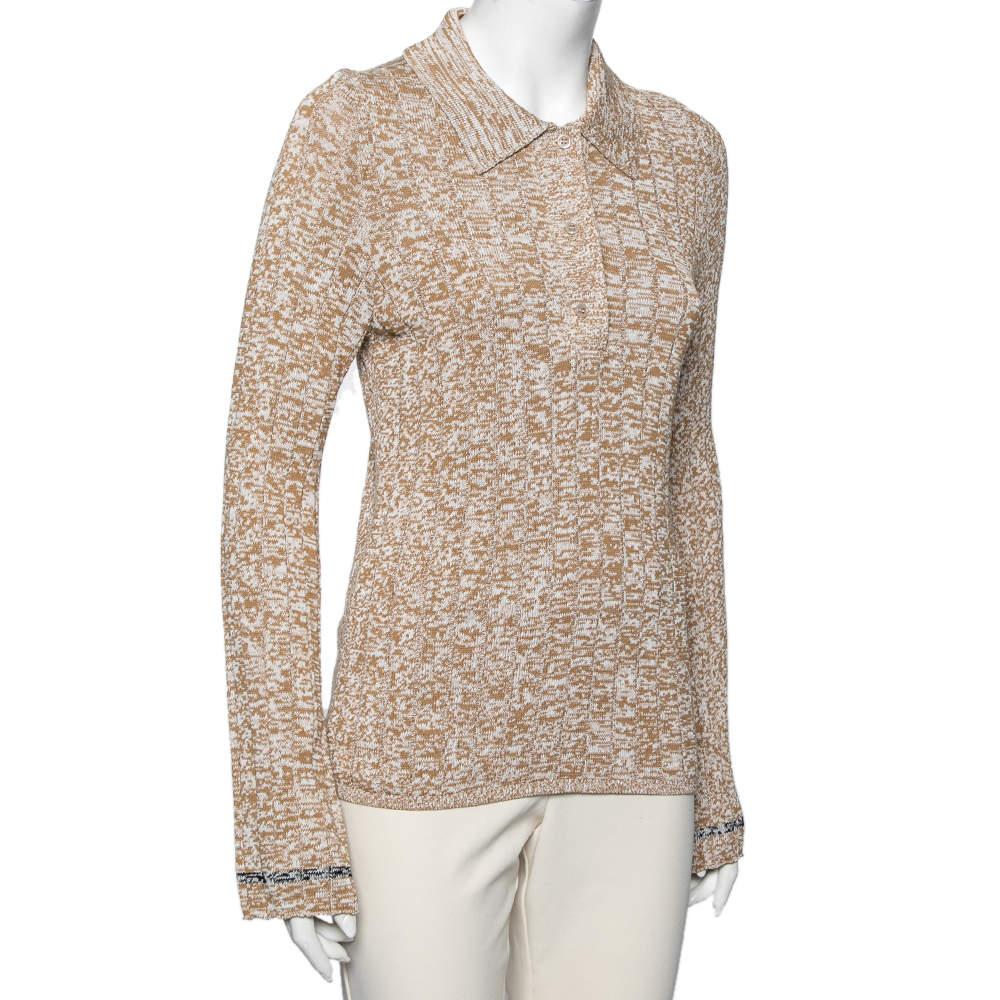 This Joseph polo sweater will make you feel stylishly warm. The beige creation is sewn using fine materials and is long-sleeved. It is complete with a flattering, snug silhouette. Just the right sweater to add to your winter wear!

