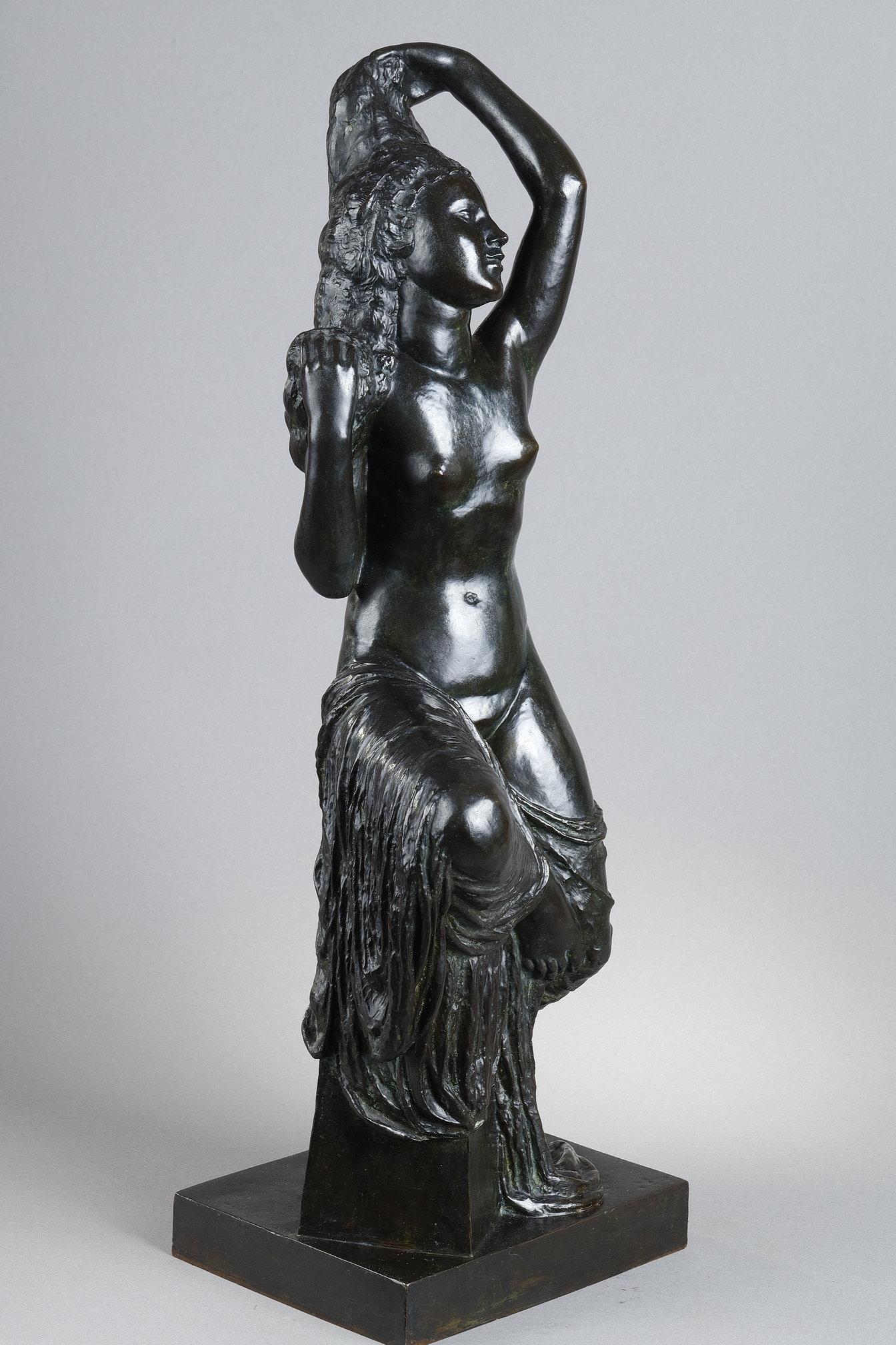 Young girl sitting at her toilet - Gold Nude Sculpture by Joseph Bernard