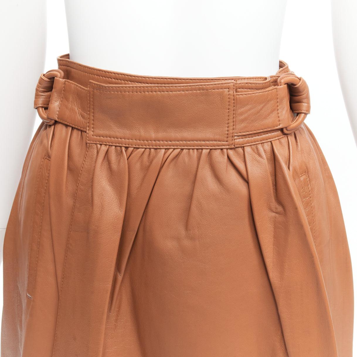 JOSEPH Betty brown lambskin leather belted A-line midi wrap skirt FR34 XS
Reference: SNKO/A00317
Brand: Joseph
Model: Betty
Material: Lambskin Leather
Color: Brown
Pattern: Solid
Closure: Belt
Lining: Brown Fabric
Extra Details: Wrap and button