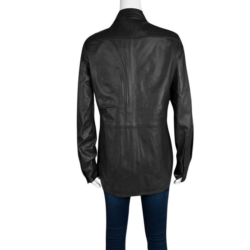 Designed at Joseph's, this elegant Garcon shirt is crafted from lambskin glove leather. It is available in black colour. This compressed collar shirt is a hand woven piece of clothing, making it elegant as well as comfortable. It features front