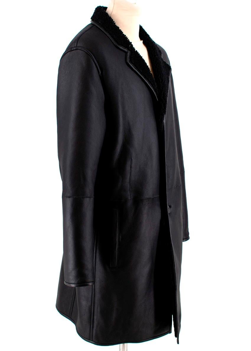 Joseph Black Lambskin Shearling Longline Coat

- Soft touch fabric
- Fur lapels and lining
- Button fastening
- Large outer pockets

Materials:
Outer
100% Lambskin
Inner
100% Real Dyed Fur

Dry Clean Only

Made in Turkey

All measurements are taken