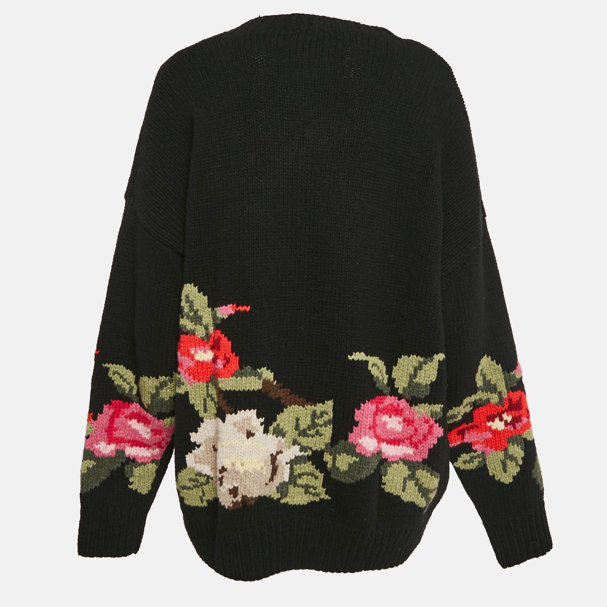 The Joseph sweater showcases exquisite craftsmanship  featuring a charming parrot and floral design. Made from high quality yarn  it offers both warmth and comfort. The intricate hand knit pattern adds a unique touch  making it perfect for any