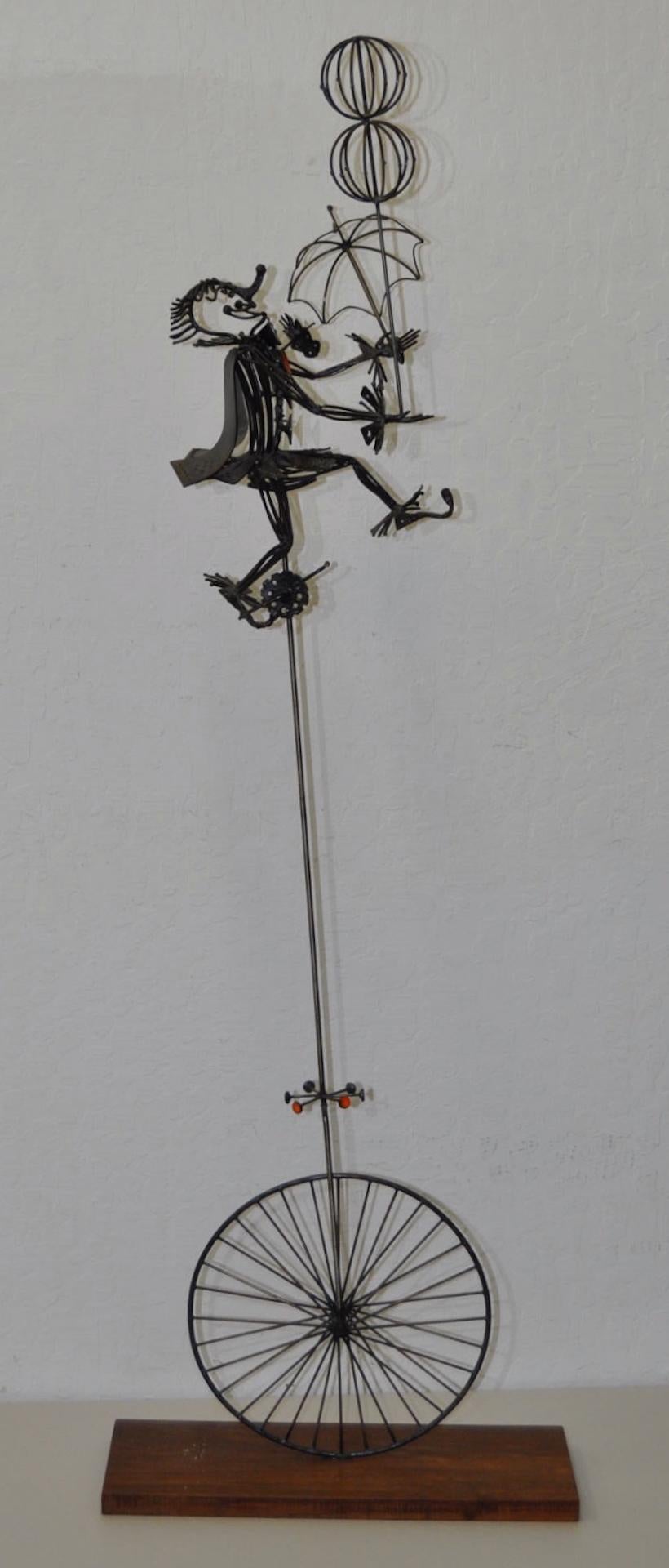 Joseph Burlini (American, B.1937) metal sculpture with enamel highlights, circa 1969

Whimsical metal and enamel sculpture by noted sculptor Jospeh Burlini.

This clown is riding high on his unicycle as he shows off a balancing act for the