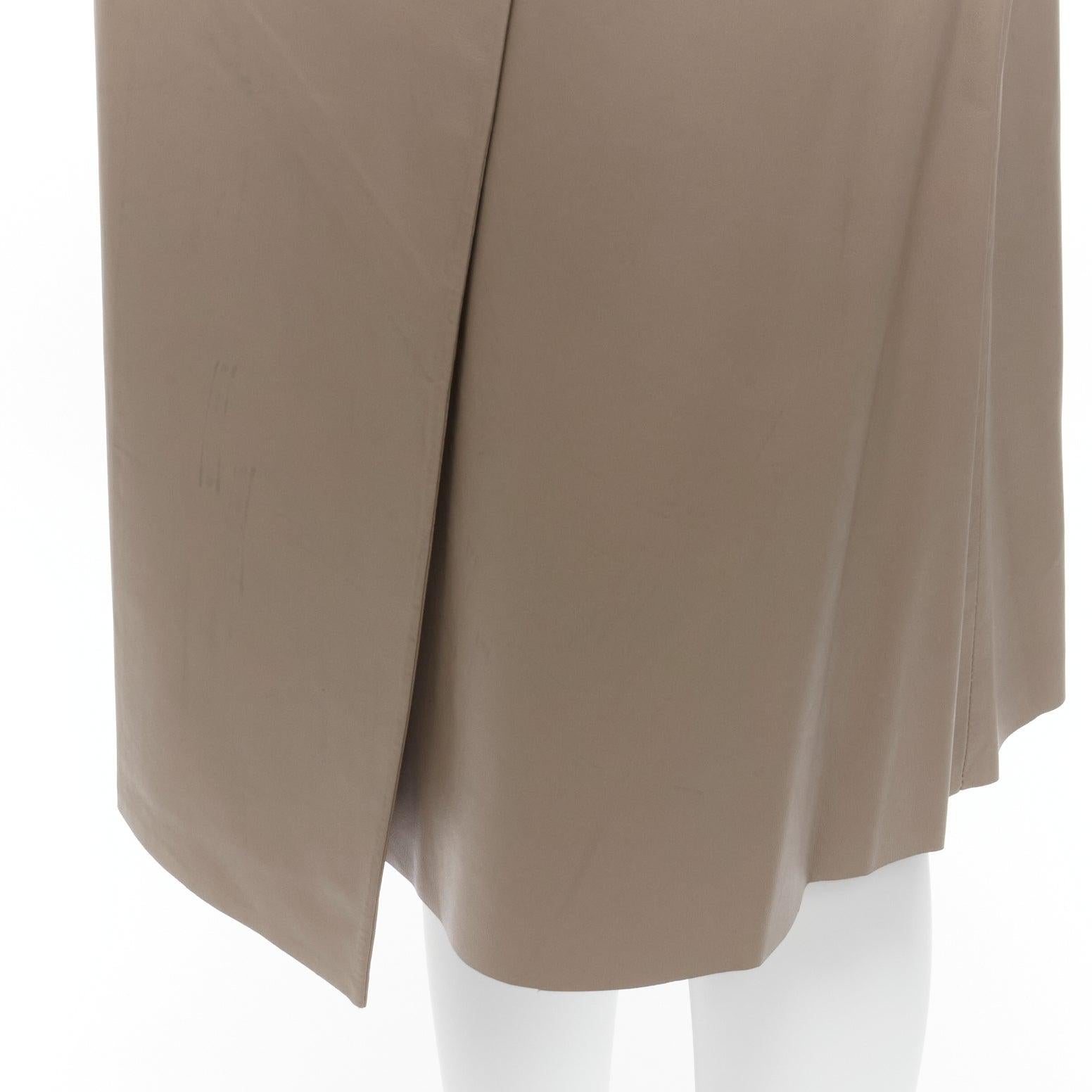 JOSEPH Charlene stone beige lambskin leather minimal split A-line wrap skirt FR36 S
Reference: SNKO/A00312
Brand: Joseph
Model: Charlene
Material: Leather
Color: Beige
Pattern: Solid
Closure: Zip
Lining: Black Fabric
Extra Details: Side zip detail.