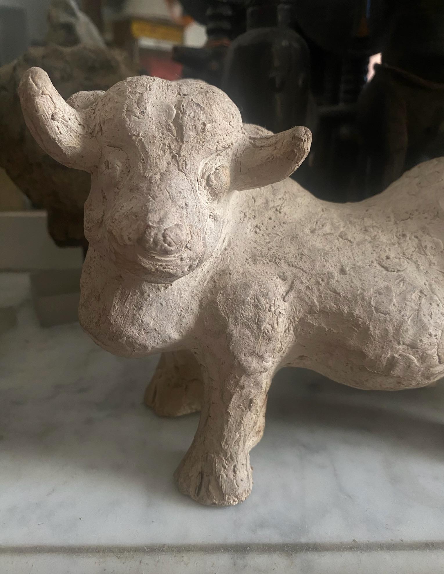 This striking, characterful bull is a wonderful, early, and truly unique piece by the Russian/French sculptor Joseph Constant (1892-1969). Dating from the 1940s, this animal subject was hand-modelled—as opposed to cast—making it a singular piece