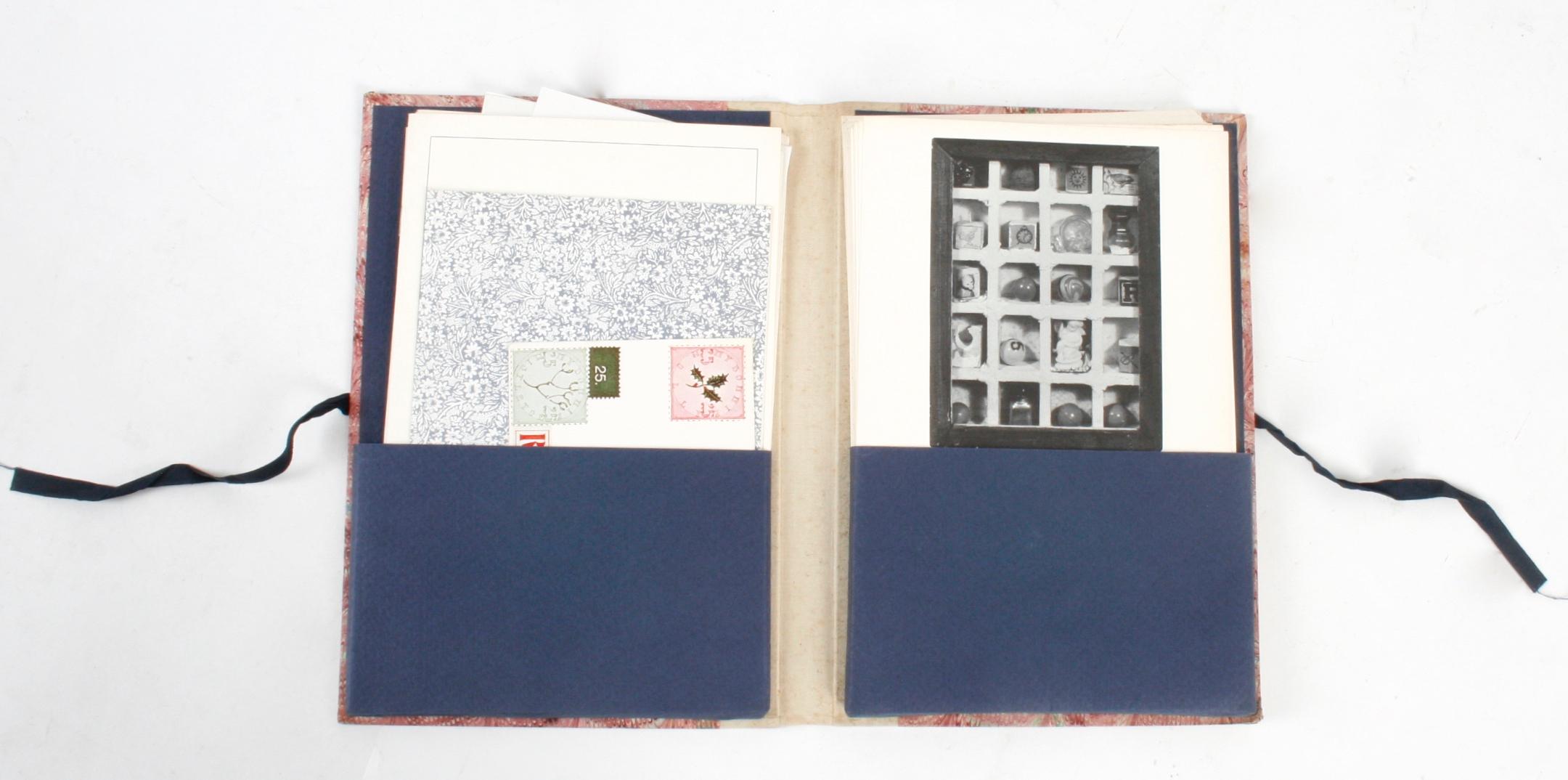 Joseph Cornell Portfolio – catalogue. New York: Leo Castelli Gallery, 1976. Hardcover portfolio with tie closure. A catalogue from a Leo Castelli exhibition of Joseph Cornell's work in 1976. The left side of the piece contains a bibliography, a