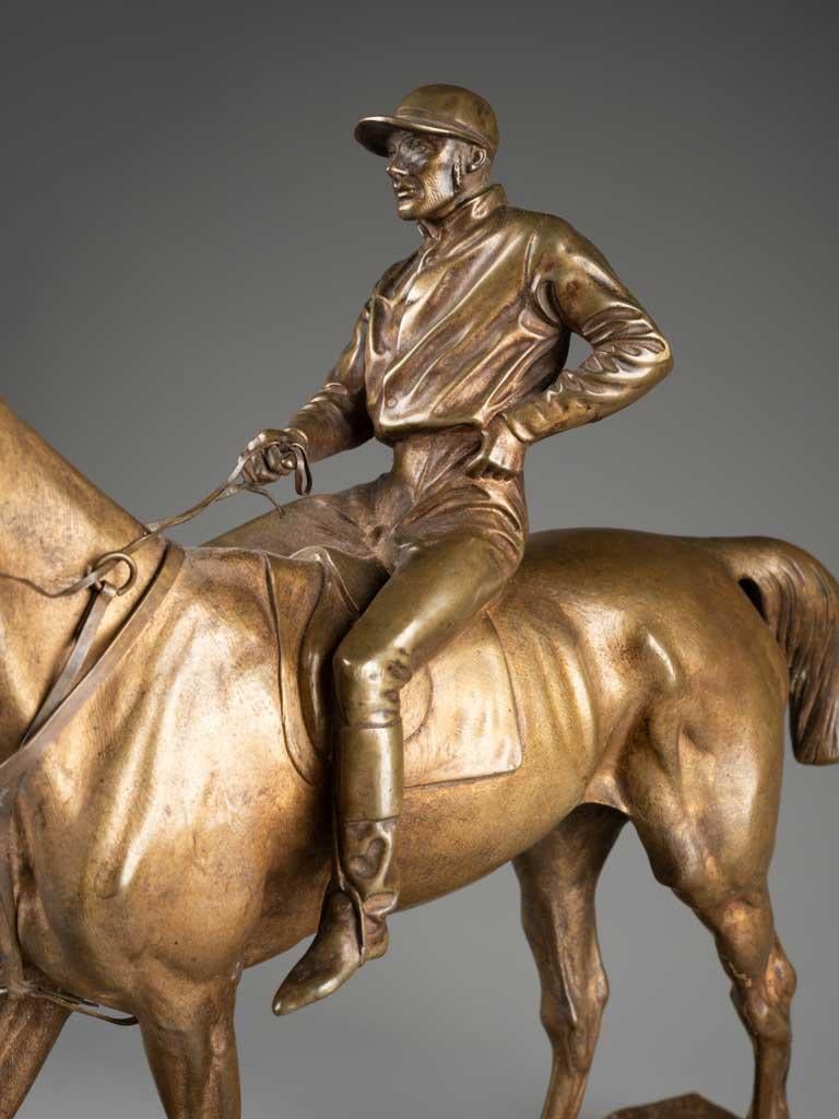 bronze jockey on horse