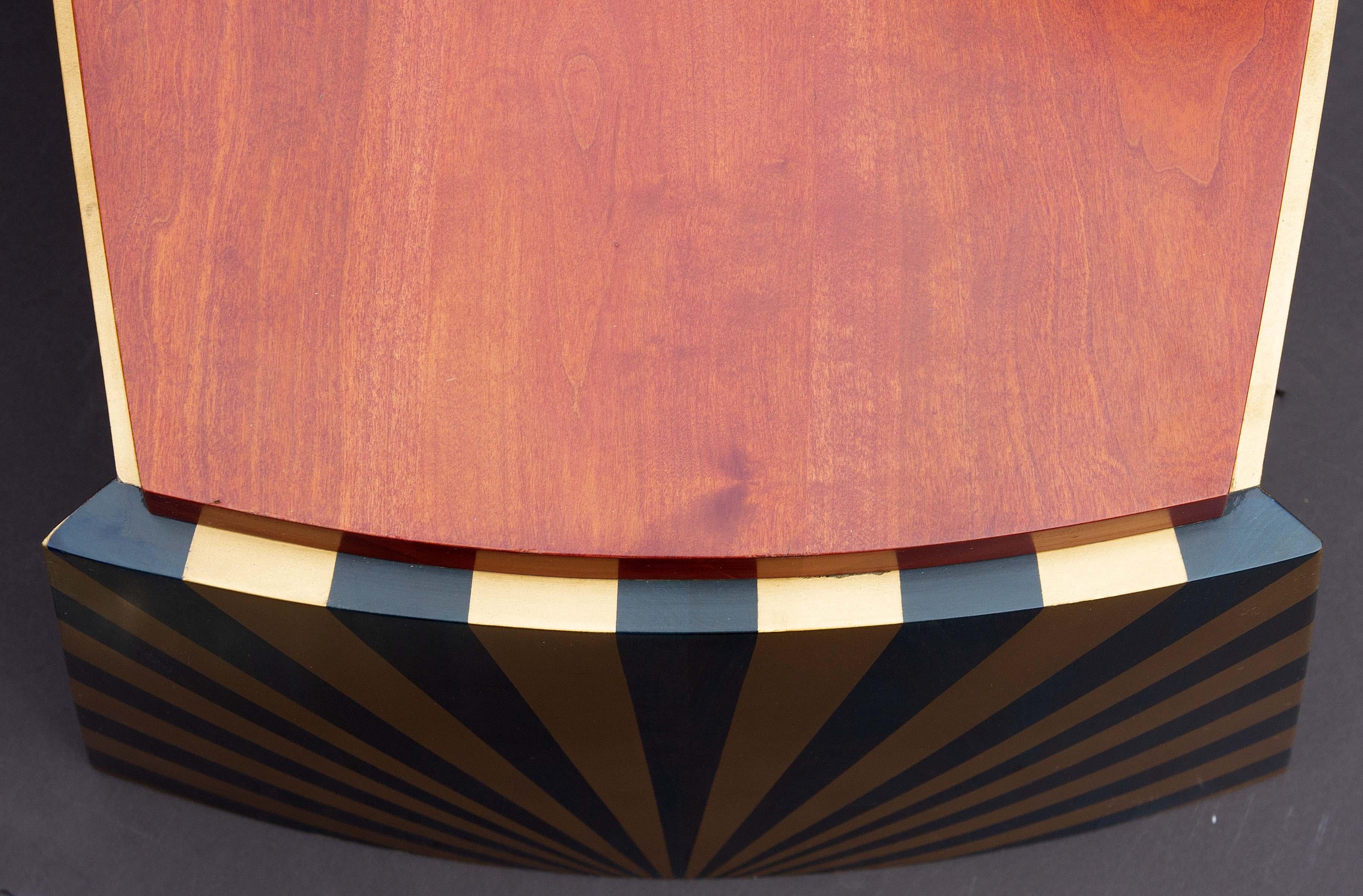 A unique handmade sculptural coffee table. Designed after the  mask of Tutankhamun. Made by Joseph Dasta. 1990. Solid cherry, aniline dye, lacquer. Hand rubbed finish. Hand planed boards. Hand cut joints. History of the table: I made this table in