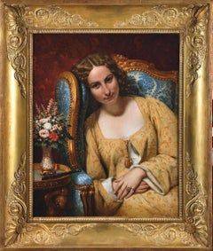 Mujer acurrucada en un sillón