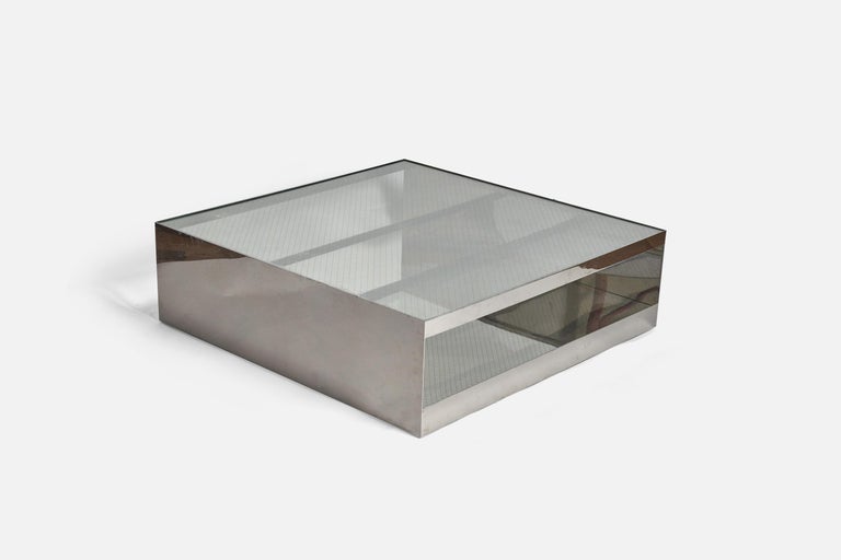 A stainless steel and glass coffee table, model 6048T, designed by Joseph D'Urso and produced by Knoll, United States, 1981. 

