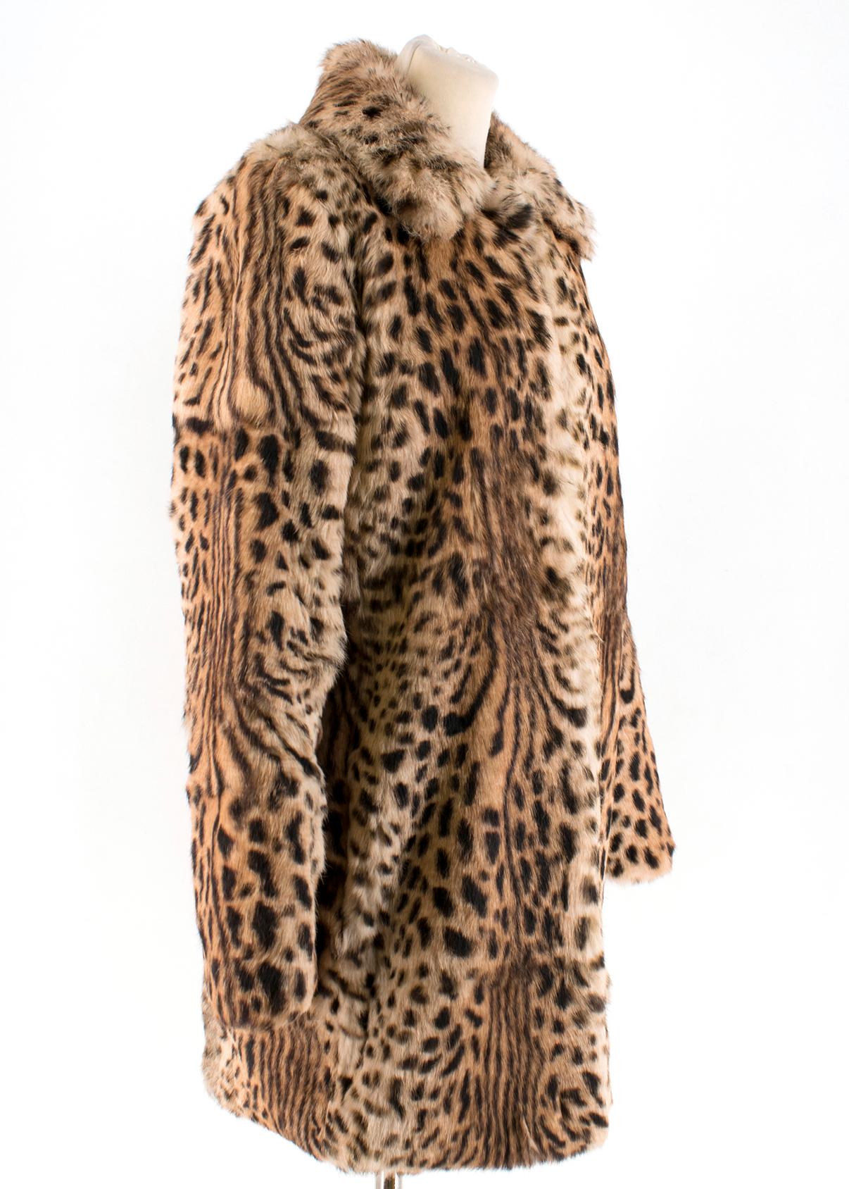 Joseph Rabbit Rur Leopard-print Coat

- Beige & brown leopard-print coat
- 100% rabbit fur
- Centre-front concealed hook-and-eye fastening
- Front side pockets
- Pointed collar

Please note, these items are pre-owned and may show some signs of