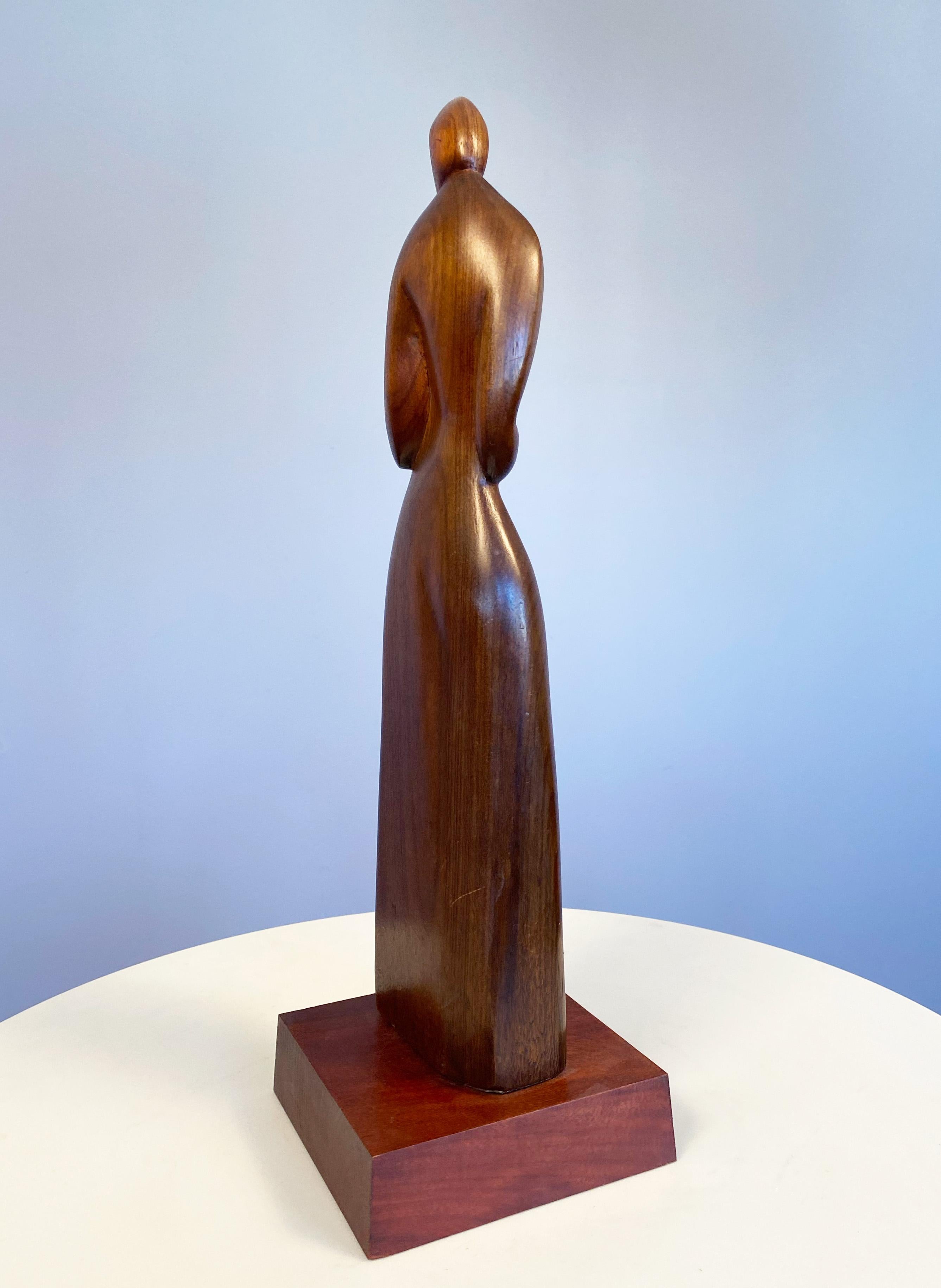 Joseph Goethe was one of our finest American modernist carvers in wood.  He loved to use exotic and or beautiful woods to inspire his compositions which ranged from figurative, to animal or aviary in form - to completely abstract.  In this piece he