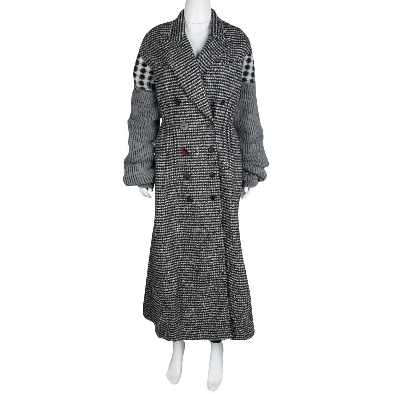 The fashionista in you would definitely be overjoyed to own a creation as uniquely stylish as this overcoat from Joseph. It has been finely knit from the finest materials and designed with a check pattern, jacquard detailing and a double-breasted