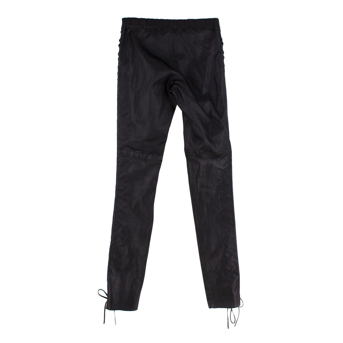 Joseph Harley Stretch Leather Pants 

- Lace-Up Detail to the legs
- Pull on
- Unlined
-Made from fine lambskin
-Elastic waistband 

Measurements: 

38cm waist
38cm hip
20cm rise 
109cm length 
93cm inside leg 

All measurements are taken when the