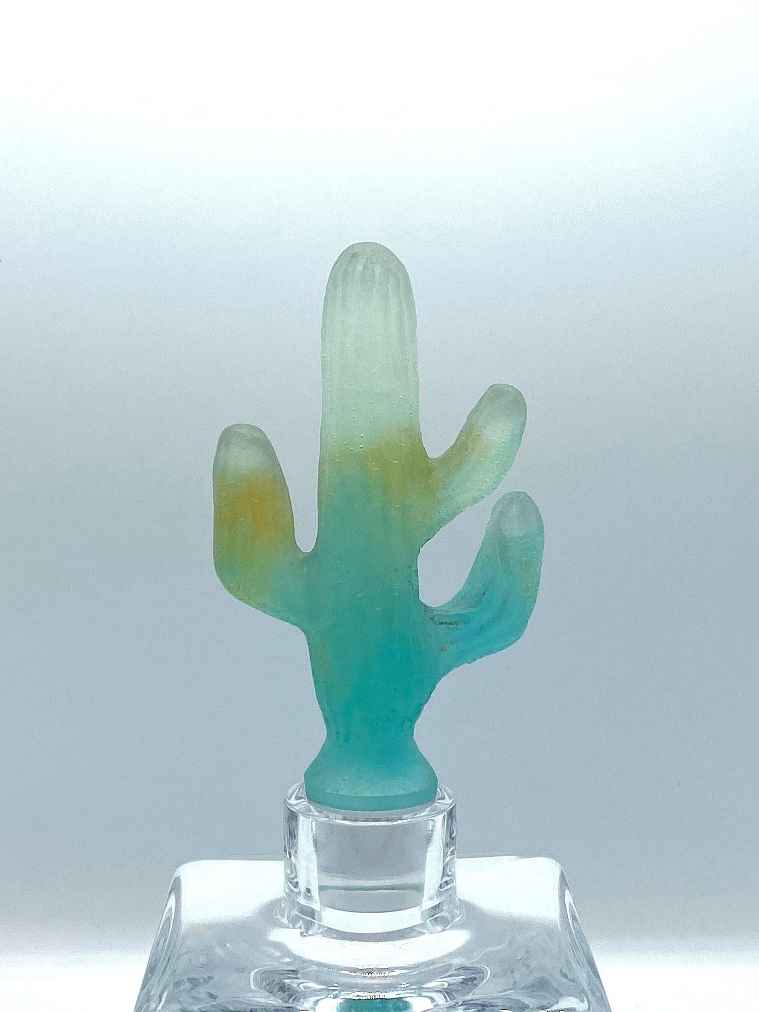 Rare, unique and highly collectible Daum crystal decanter with a pâte de verre cactus shaped stopper. The designer Joseph Hilton McConnico began his collaboration with Daum France in 1987, and was the first American whose work became part of the