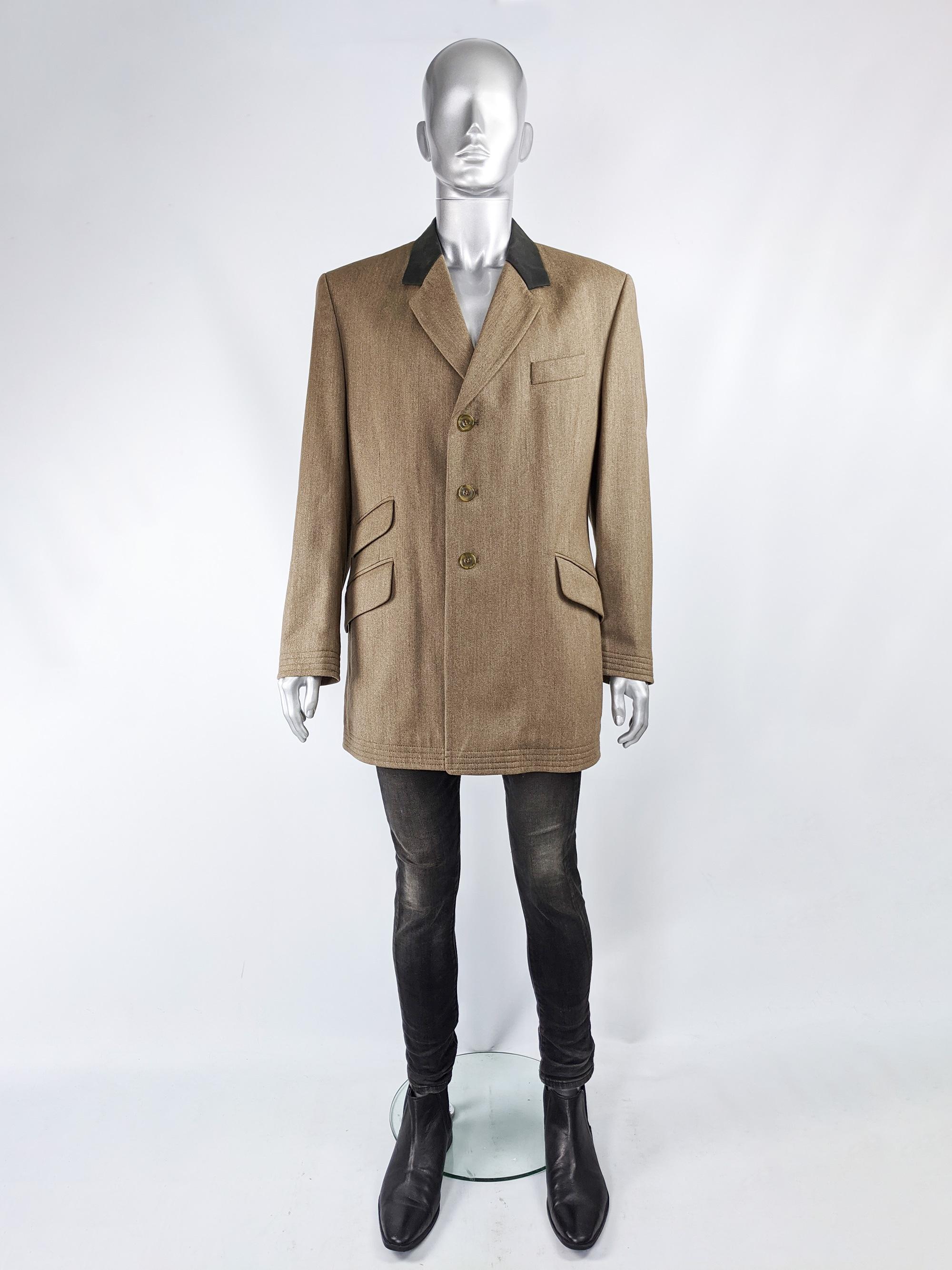 A stylish and rare vintage mens chesterfield style coat from the 90s by luxury British fashion house, Joseph. In a brown wool tweed with a waxed cotton collar, top stitching and multiple flap pockets for a timeless look. 

Size: Marked UK 40 / US 40