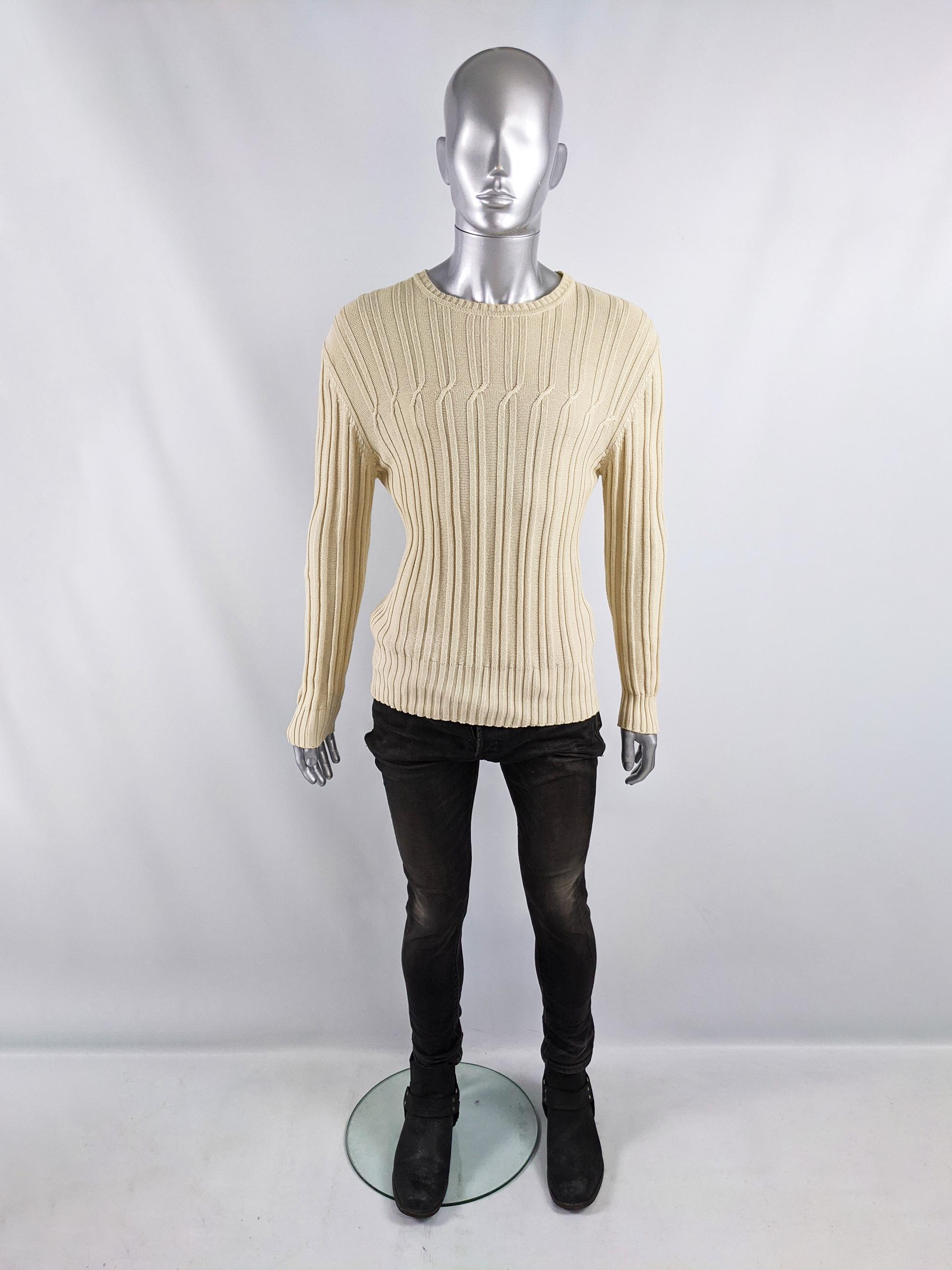 A stylish vintage mens jumper from the late 90s / early 2000s by luxury British fashion house, Joseph. Italian made, in a cream cotton knit fabric with a unique twisted / cable detail which gives a minimalist feel. 

Size: Marked EU 50 which roughly