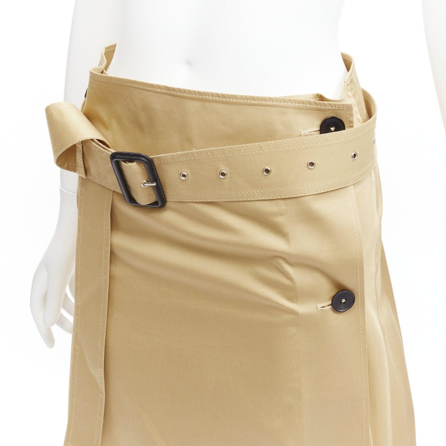 JOSEPH khaki cotton military safari belted trench inspired A-line wrap skirt FR34 XS
Reference: SNKO/A00316
Brand: Joseph
Material: Cotton
Color: Khaki
Pattern: Solid
Closure: Button
Extra Details: Wrap and button closure. Belt is detachable.
Made