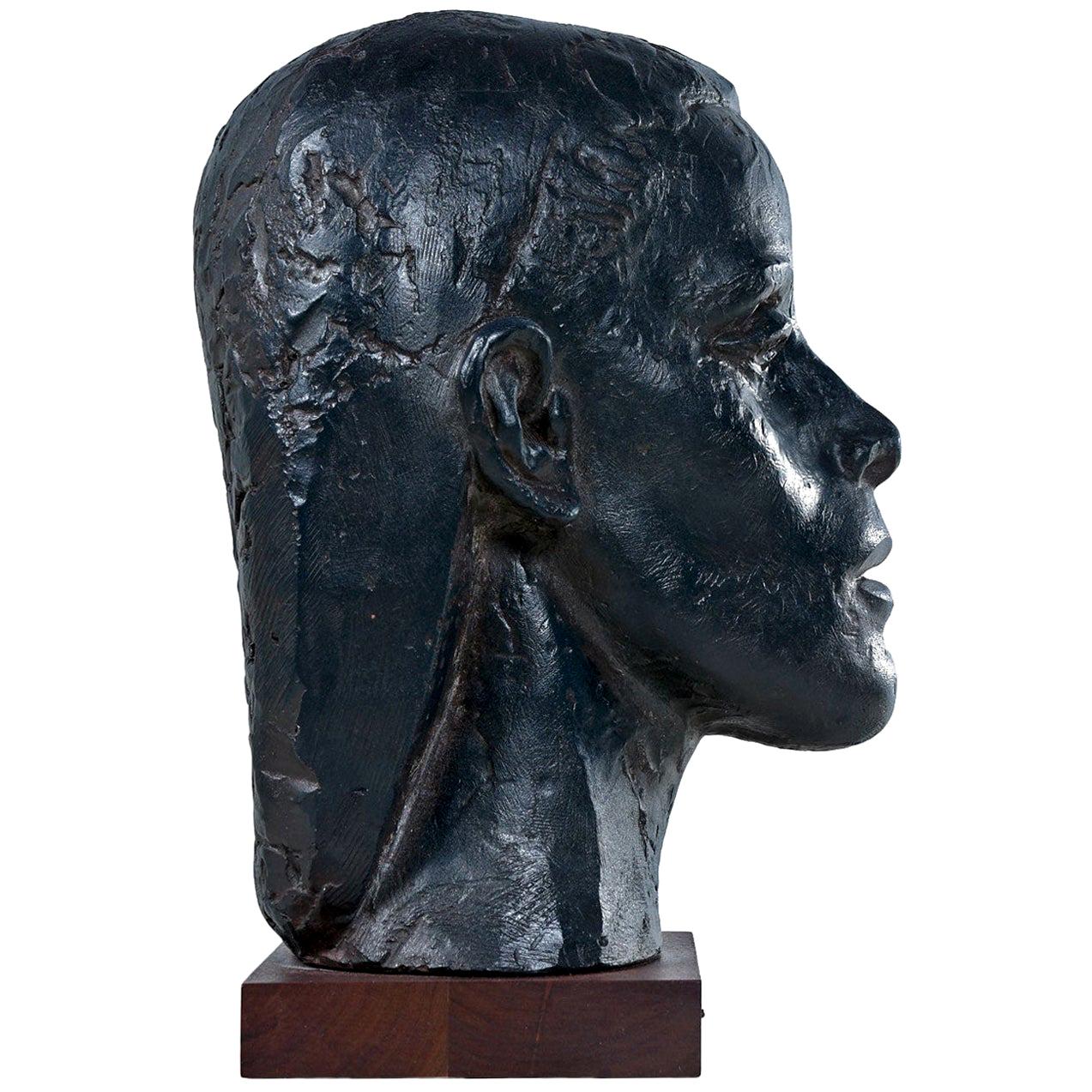 Bust of Martha Graham made by Joseph Konzal. Created in the 1950s and comprised of a painted bronze patina on plaster mounted to a wooden base. Konzal was a recognized sculptor who designed busts of other notable figures between 1930 and 1960