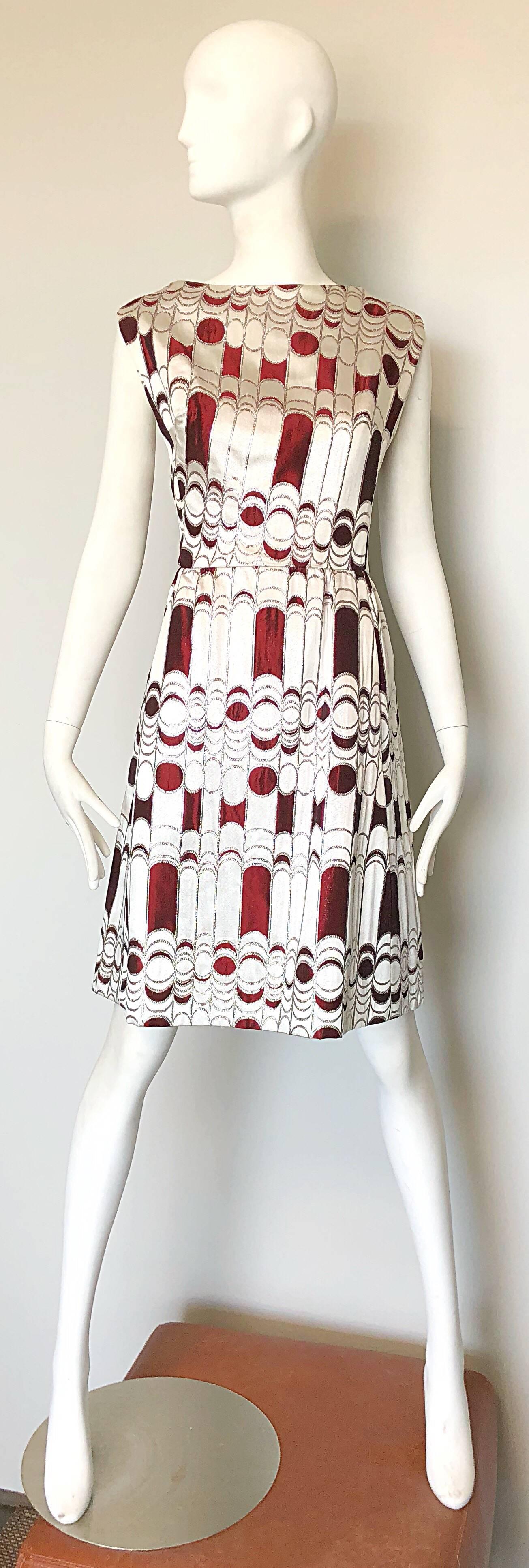 Chic vintage 1960s JOSEPH MAGNIN silver and burgundy / maroon abstract op-art print silk brocade A - Line dress! Featured a tailored bodice with a flattering forgiving skirt. POCKETS at both sides of the hips. Full metal zipper up the back with