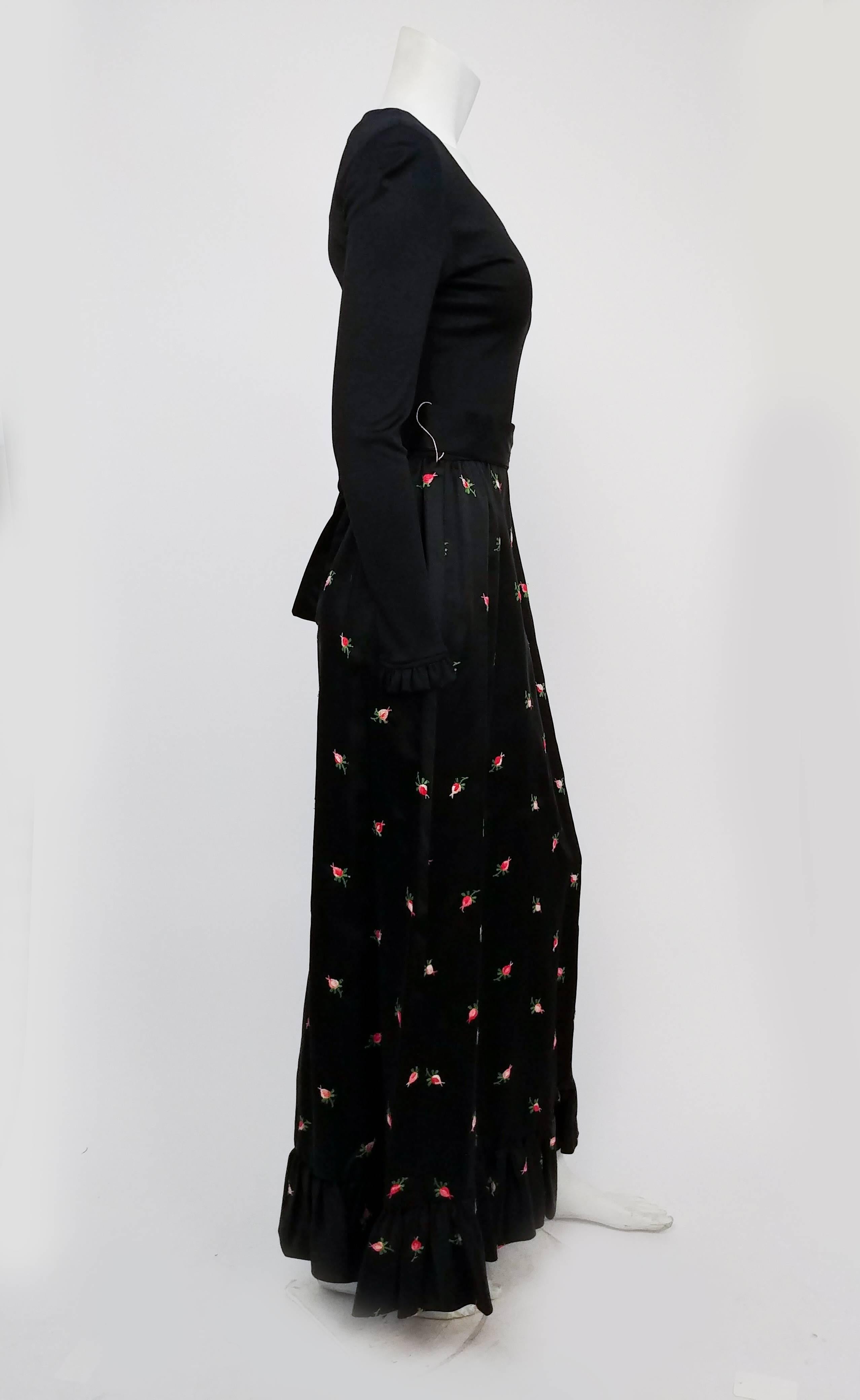 Joseph Magnin Embroidered Satin & Jersey Evening Dress, 1960s. Maxi-length evening dress with knit jersey bodice belted at waist with satin sash, and satin skirt embroidered with pink roses. 