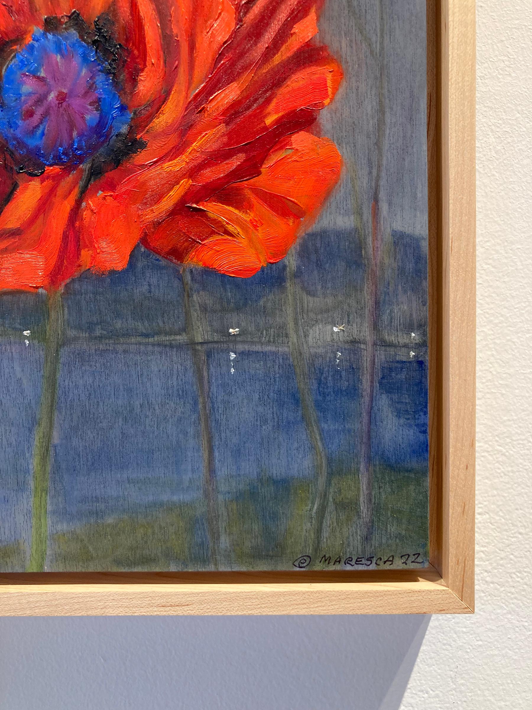 Modern still life painting of a red poppy against a navy blue river landscape 
