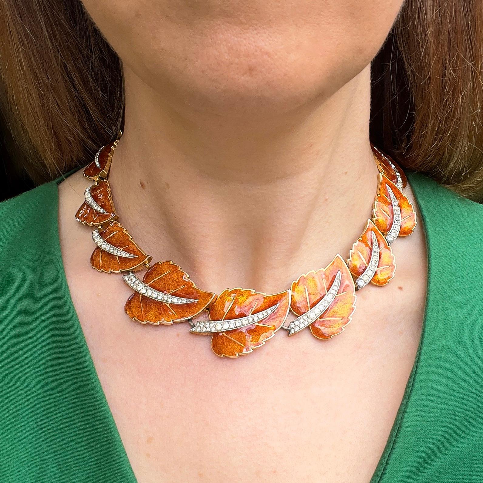 This beautiful necklace exemplifies the fine craftsmanship and intricate designs of Joseph Mazer.

Condition Report:
Excellent

The Details...
This gold plated necklace features a series of leaves graduating in size and linked together. The leaves