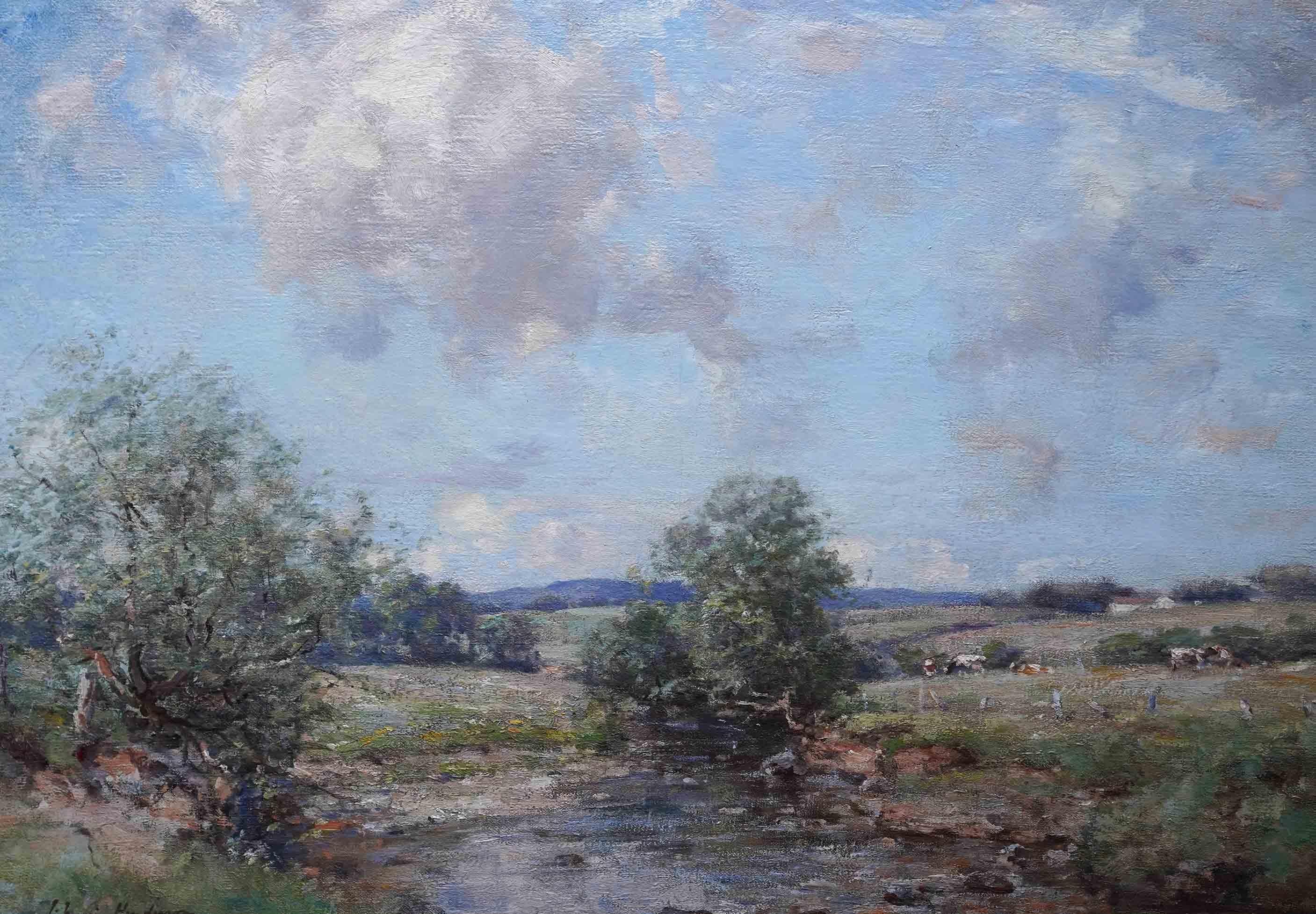 This lovely Scottish Stirlingshire Impressionist landscape is by noted artist Joseph Morris Henderson. Painted circa 1910 the composition is a river landscape with the river in the foreground and cows in the fields beyond. In the distance one can