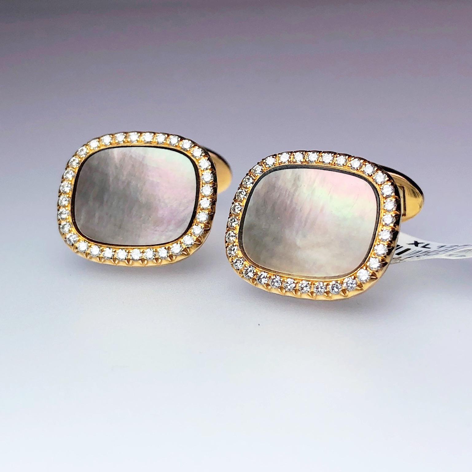 Elegant 18 karat rose gold cushion shaped cufflinks. The cufflinks are set with Tahitian Mother of Pearl which is a greyish color with a pink cast. The cufflinks are trimmed with a single row of round brilliant diamonds. They measure 7/8