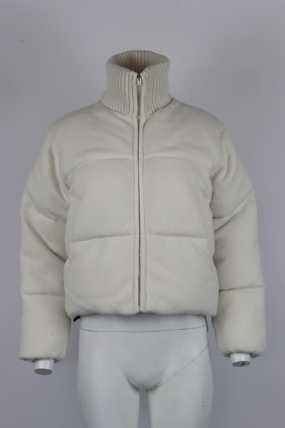 Joseph quilted wool down jacket. Cream. Long sleeve, turtleneck. Zip fastening at front. 100% Merino wool; padding: 90% duck down, 10% duck feather. Size: XSmall (UK 6, US 2, FR 34, IT 38). Bust: 44 in. Waist: 45 in. Hips: 43.6 in. Length: 20 in.