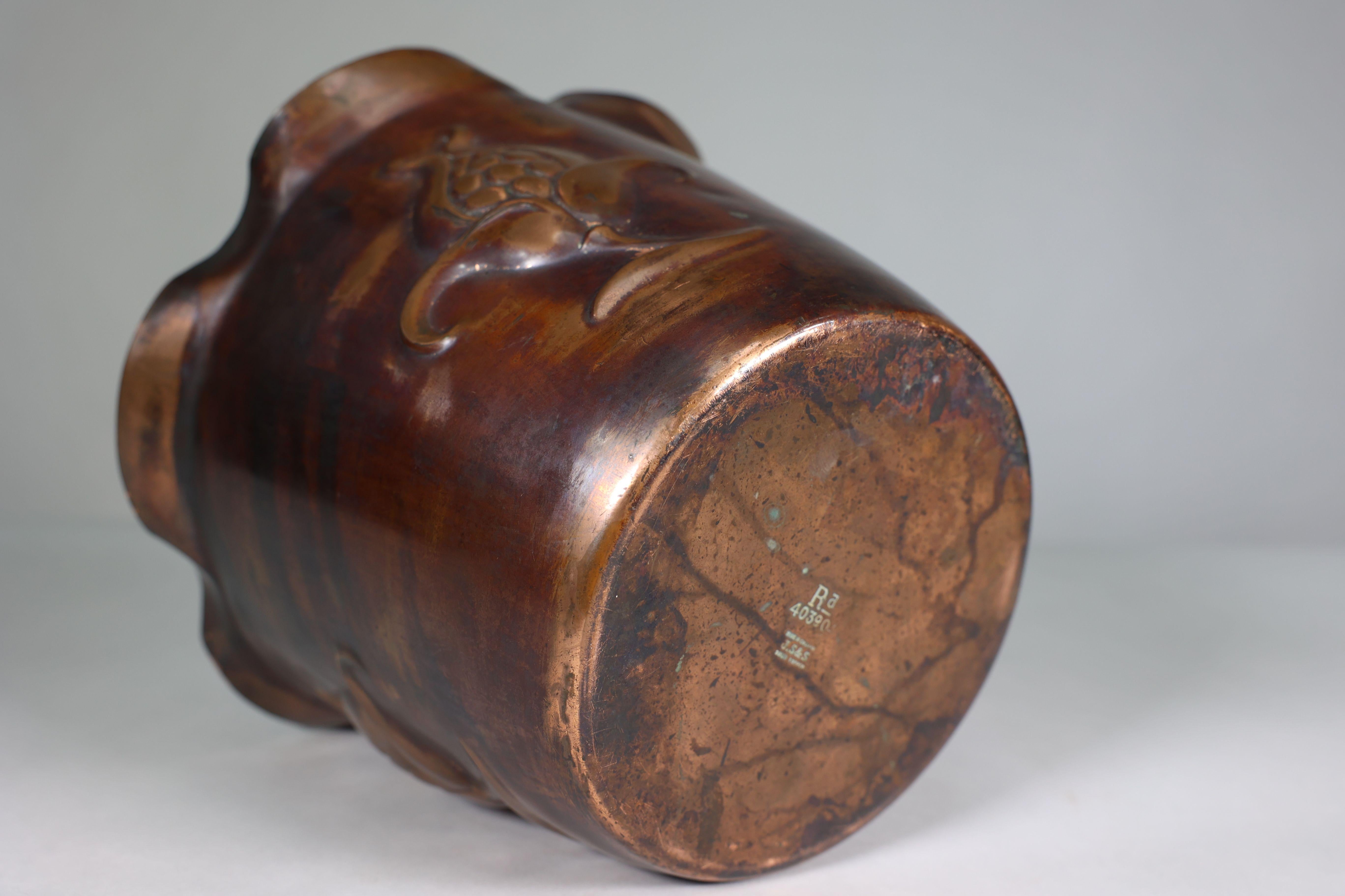 Joseph Sankey & Sons. An Arts & Crafts copper planter with embossed flower pod For Sale 9