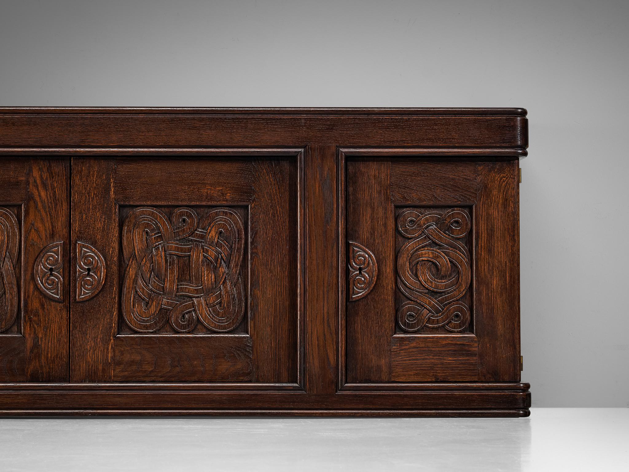 Mid-20th Century Joseph Savina Cabinet with Intricate Carvings in Oak  For Sale