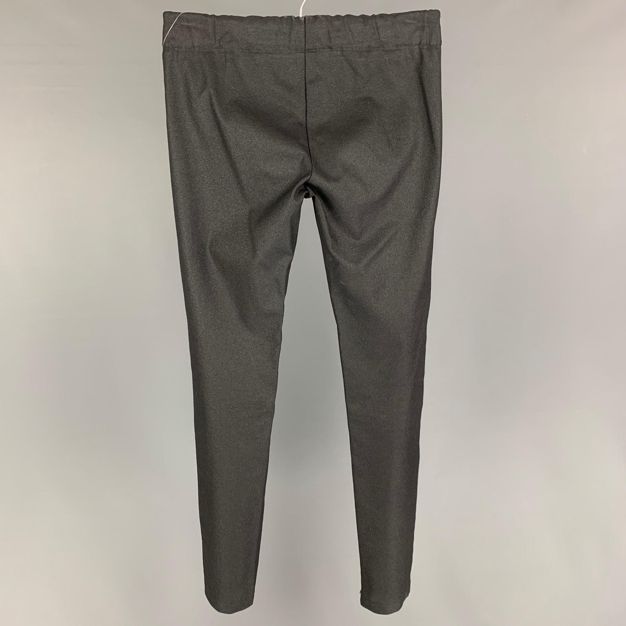 JOSEPH leggings comes in a charcoal sparkly viscose blend featuring a elastic waistband. Made in France.
Very Good
Pre-Owned Condition. 

Marked:   36 

Measurements: 
  Waist: 26 inches  Rise: 8.5 inches  Inseam: 29 inches 
  
  
 
Reference: