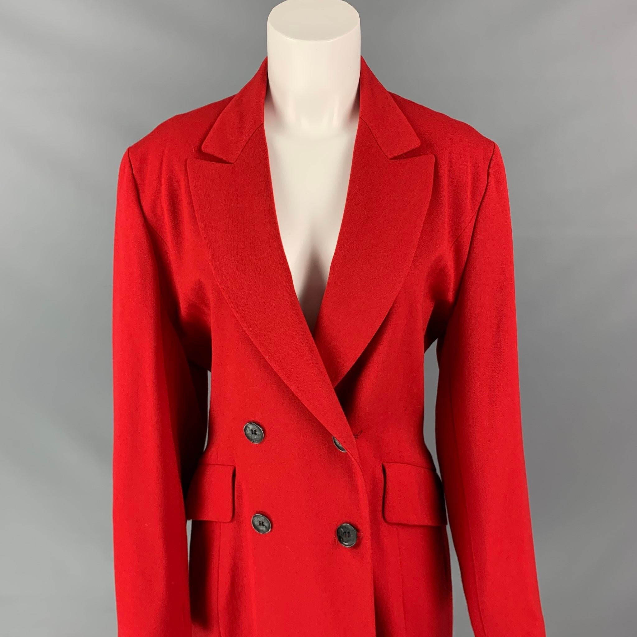 JOSEPH coat comes in a red wool with a full liner featuring a peak lapel, flap pockets, and a double breasted closure. Made in France. 

Very Good Pre-Owned Condition.
Marked: 2

Measurements:

Shoulder: 16.5 in.
Bust: 38 in.
Sleeve: 25 in.
Length: