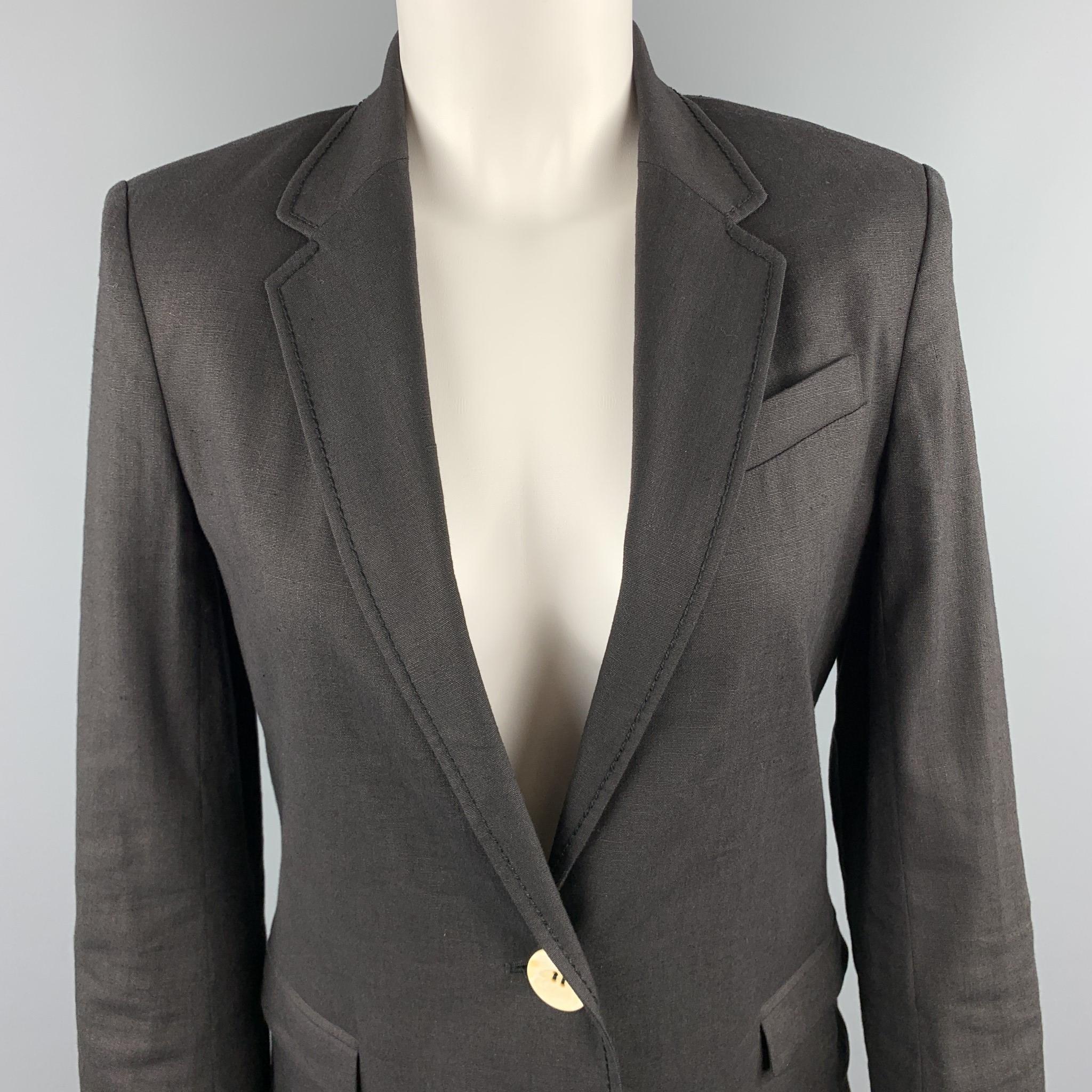 JOSEPH blazer comes in black woven linen blend with a notch lapel and single button closure. Made in France.

Excellent Pre-Owned Condition.
Marked:
Original Retail Price: $825.00

Measurements:

Shoulder: 15 in.
Bust: 35 in.
Sleeve: 24 in.
Length: